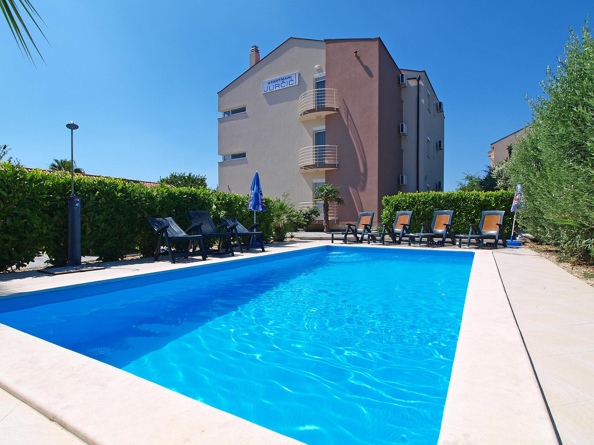 Photo 1 - Appartement de 2 chambres à Bibinje avec piscine et vues à la mer