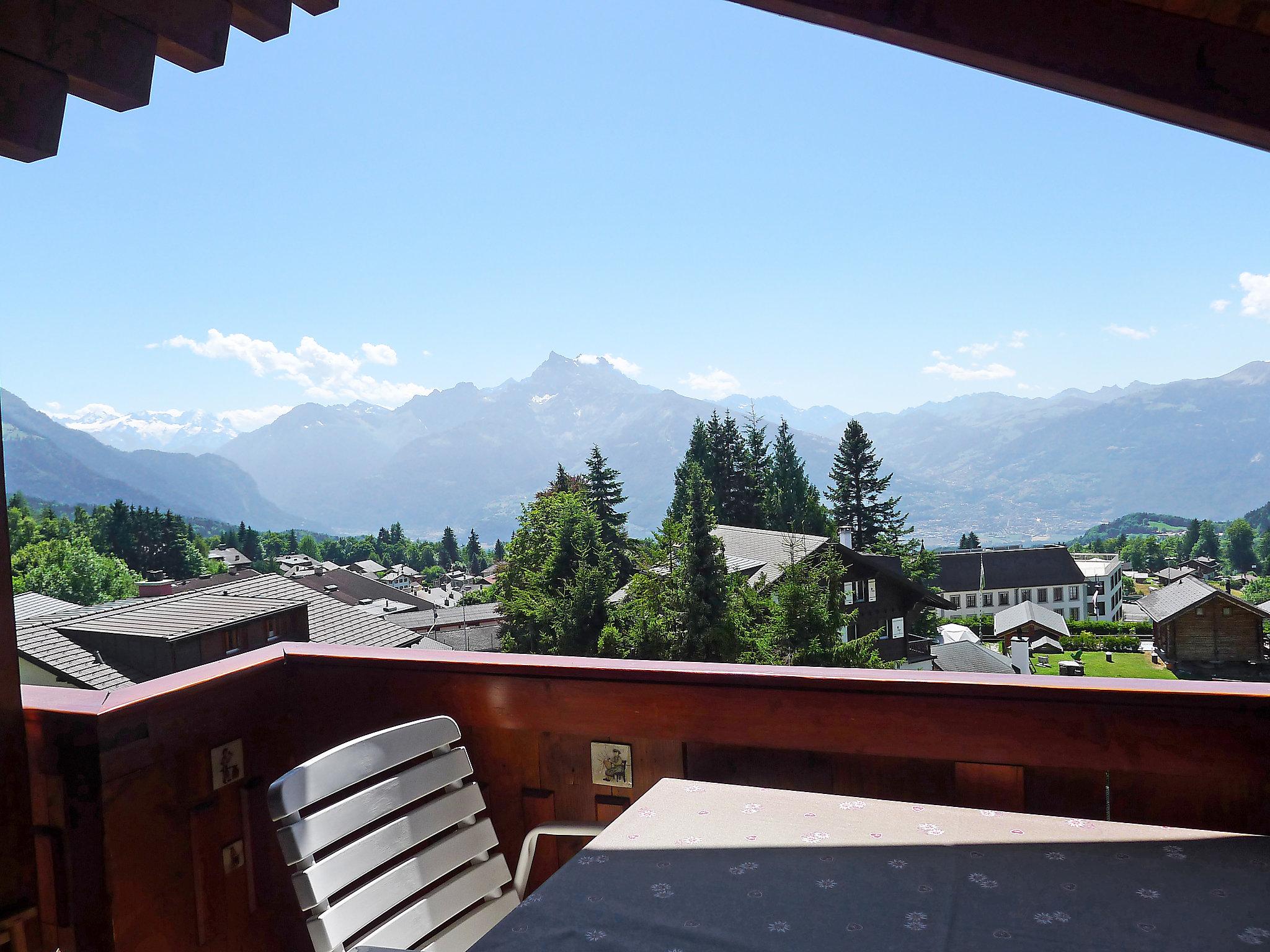 Photo 5 - Appartement de 2 chambres à Ollon avec piscine et vues sur la montagne