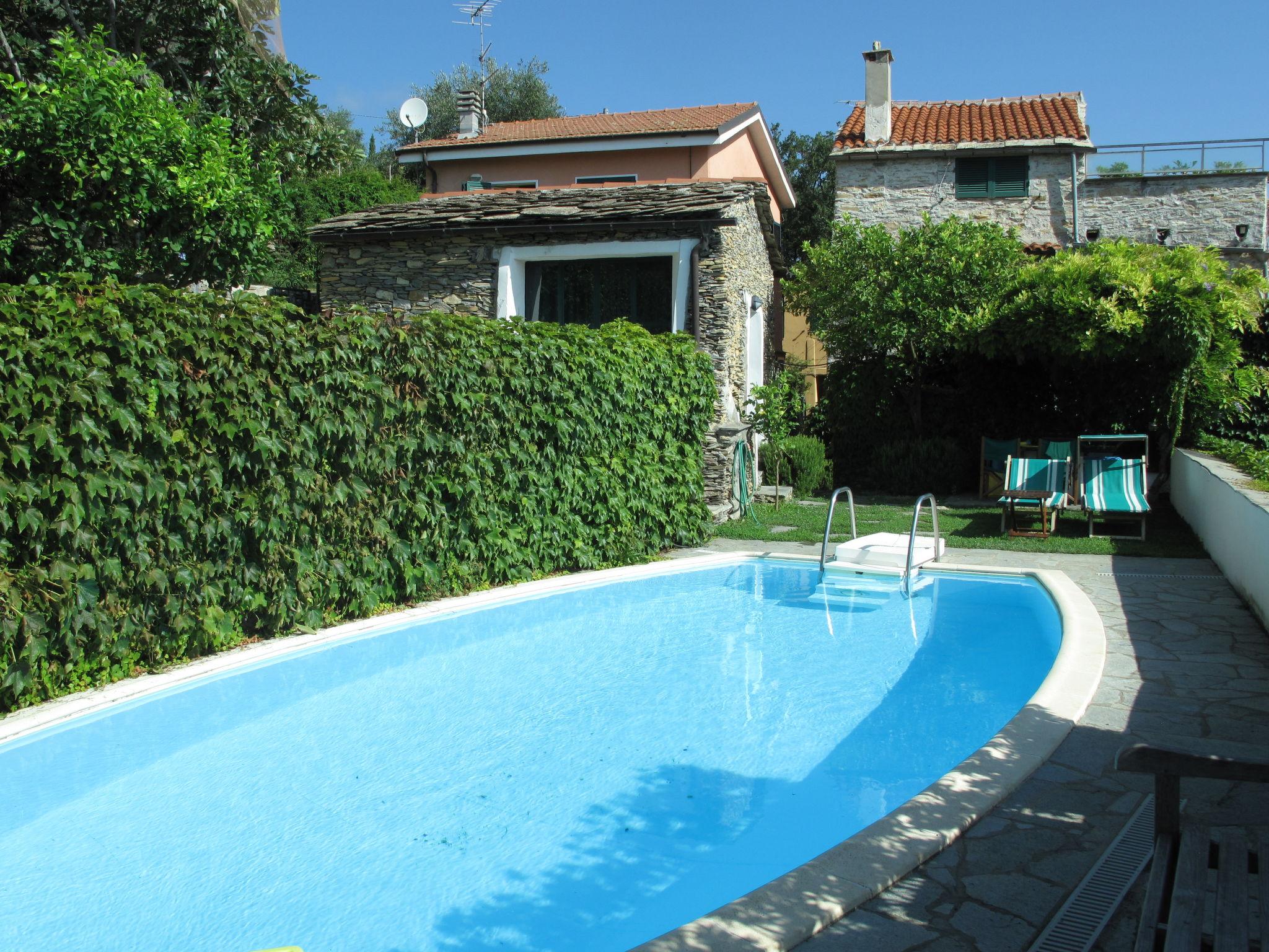 Foto 20 - Casa con 2 camere da letto a Dolcedo con piscina e giardino