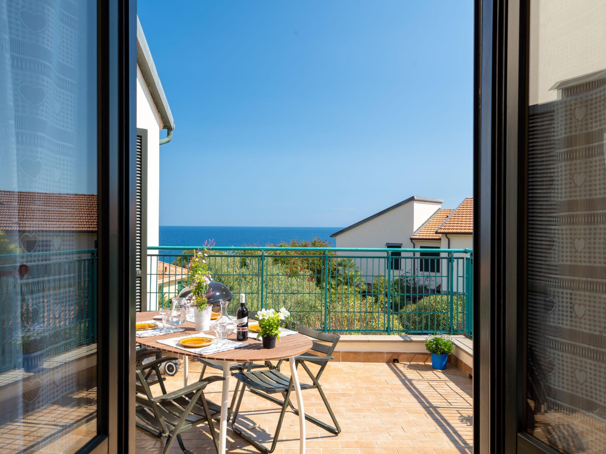 Foto 10 - Apartamento de 1 habitación en Cipressa con piscina y vistas al mar