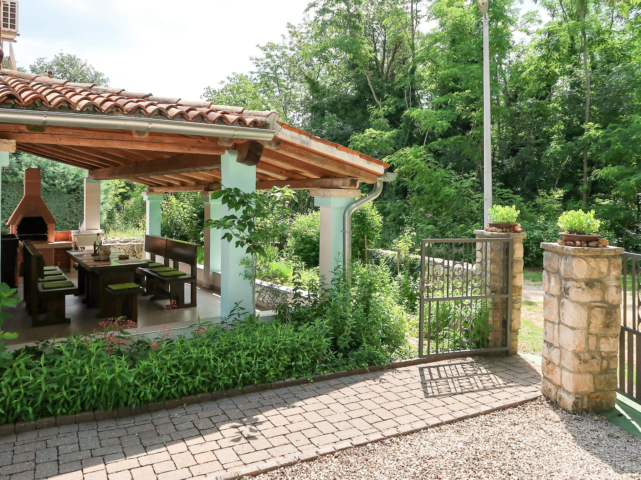 Photo 3 - Maison de 3 chambres à Sveta Nedelja avec piscine privée et vues à la mer