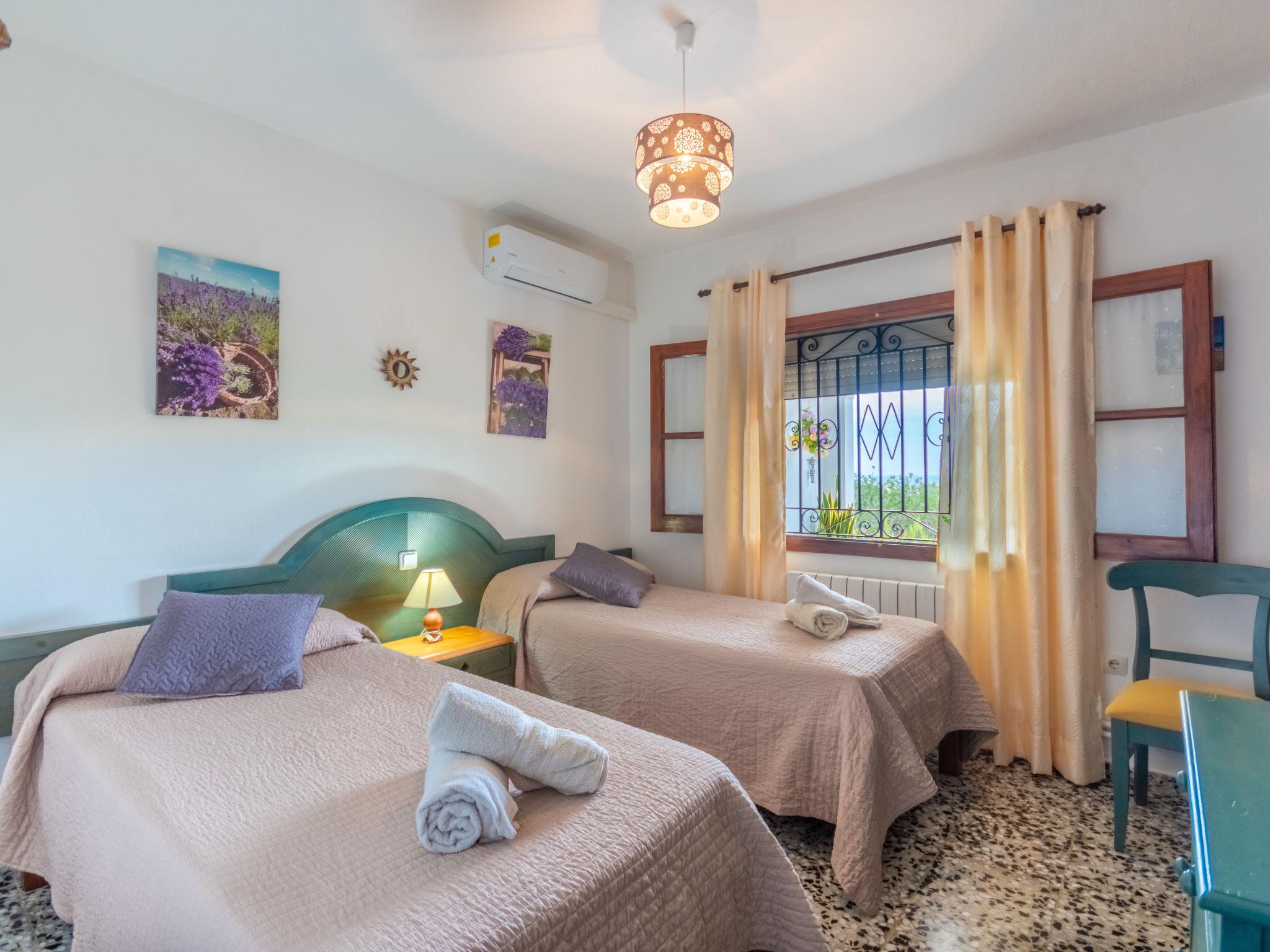 Foto 14 - Casa con 3 camere da letto a Santa Eulària des Riu con piscina privata e vista mare