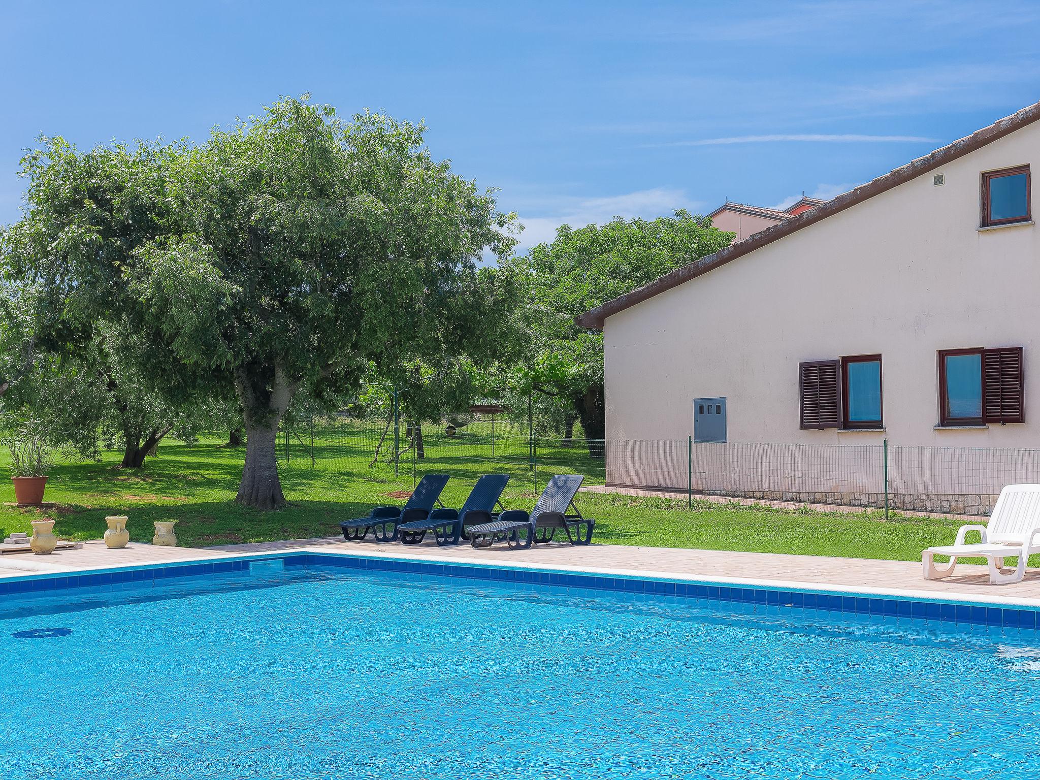 Photo 16 - Maison de 2 chambres à Umag avec piscine et vues à la mer