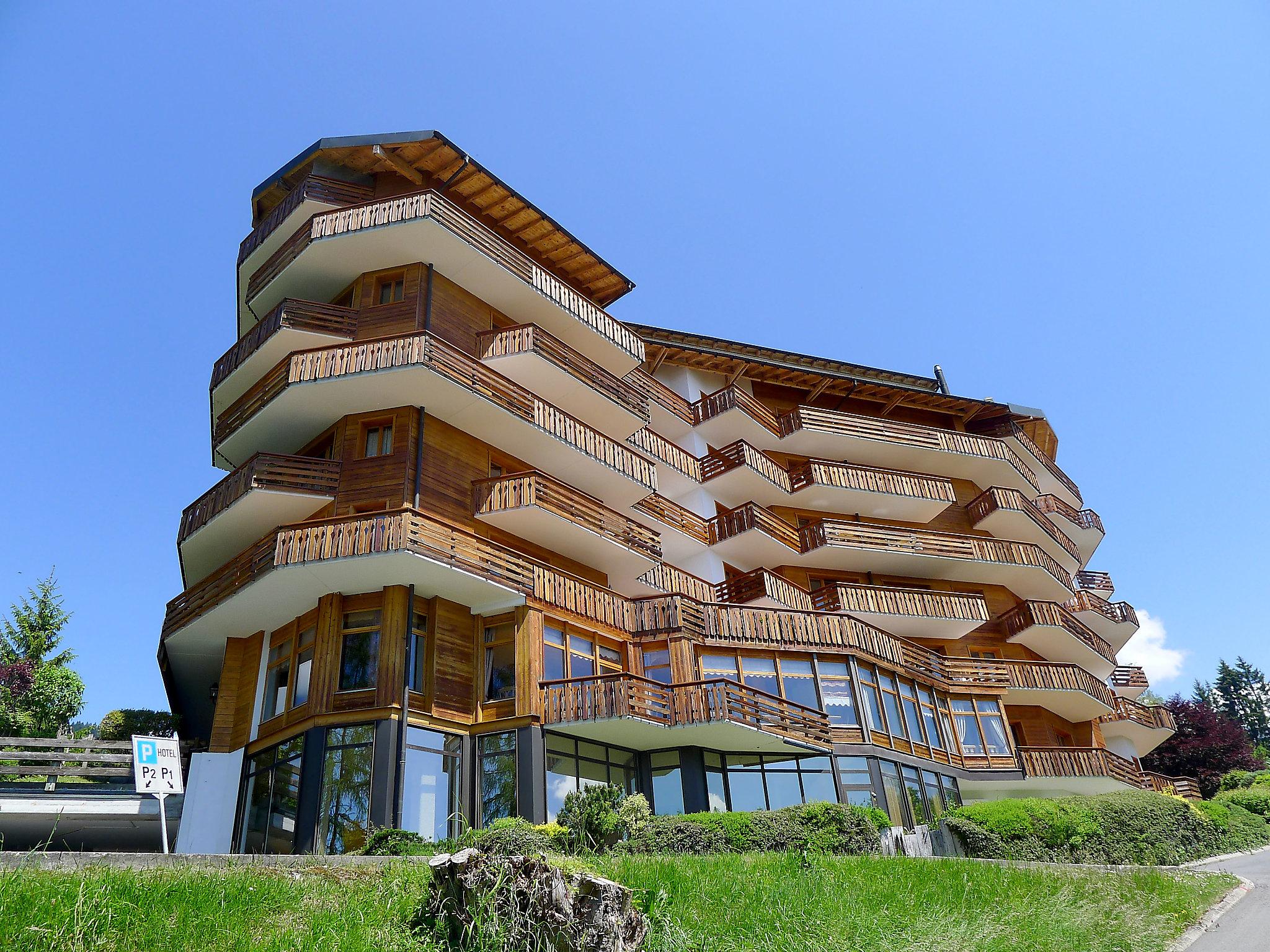 Photo 3 - Appartement de 1 chambre à Ollon avec piscine et vues sur la montagne