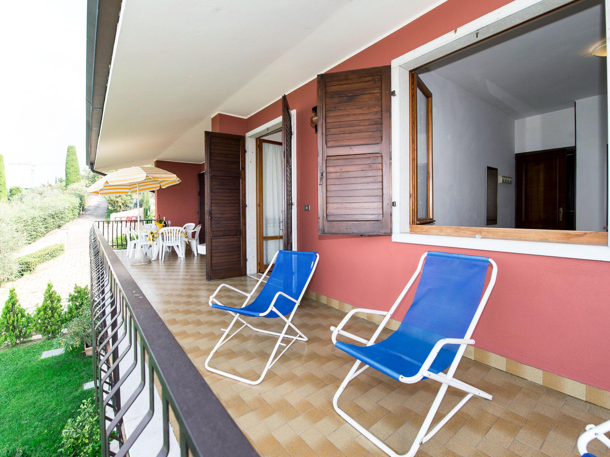 Photo 23 - Appartement de 3 chambres à Torri del Benaco avec piscine et vues sur la montagne