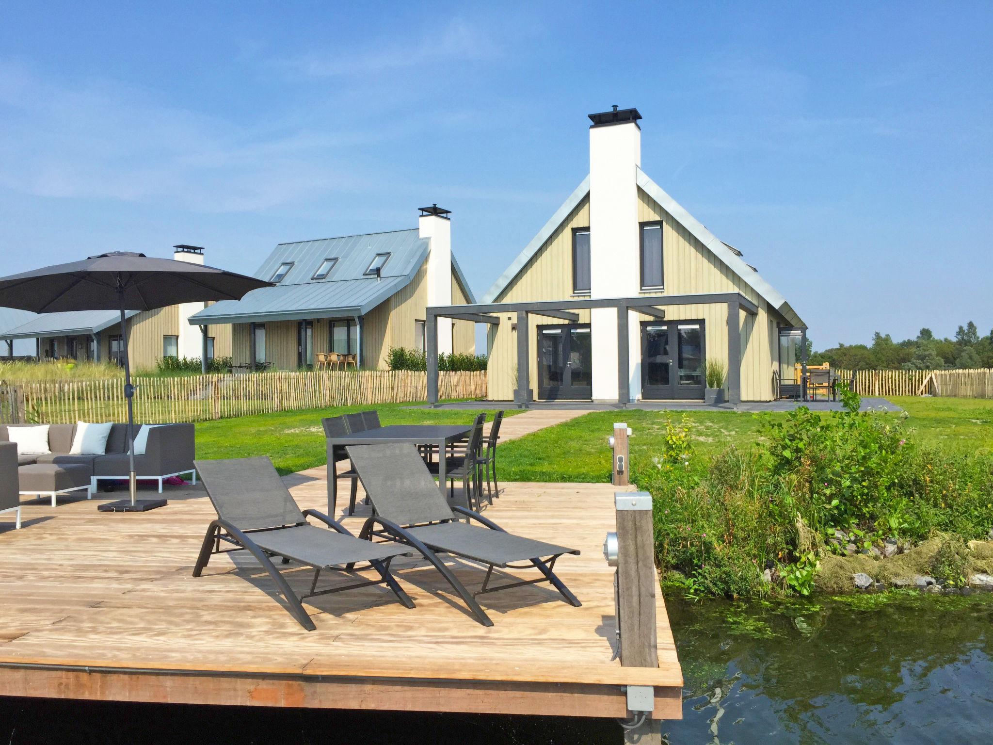 Photo 1 - Maison de 5 chambres à Tholen avec sauna et bain à remous