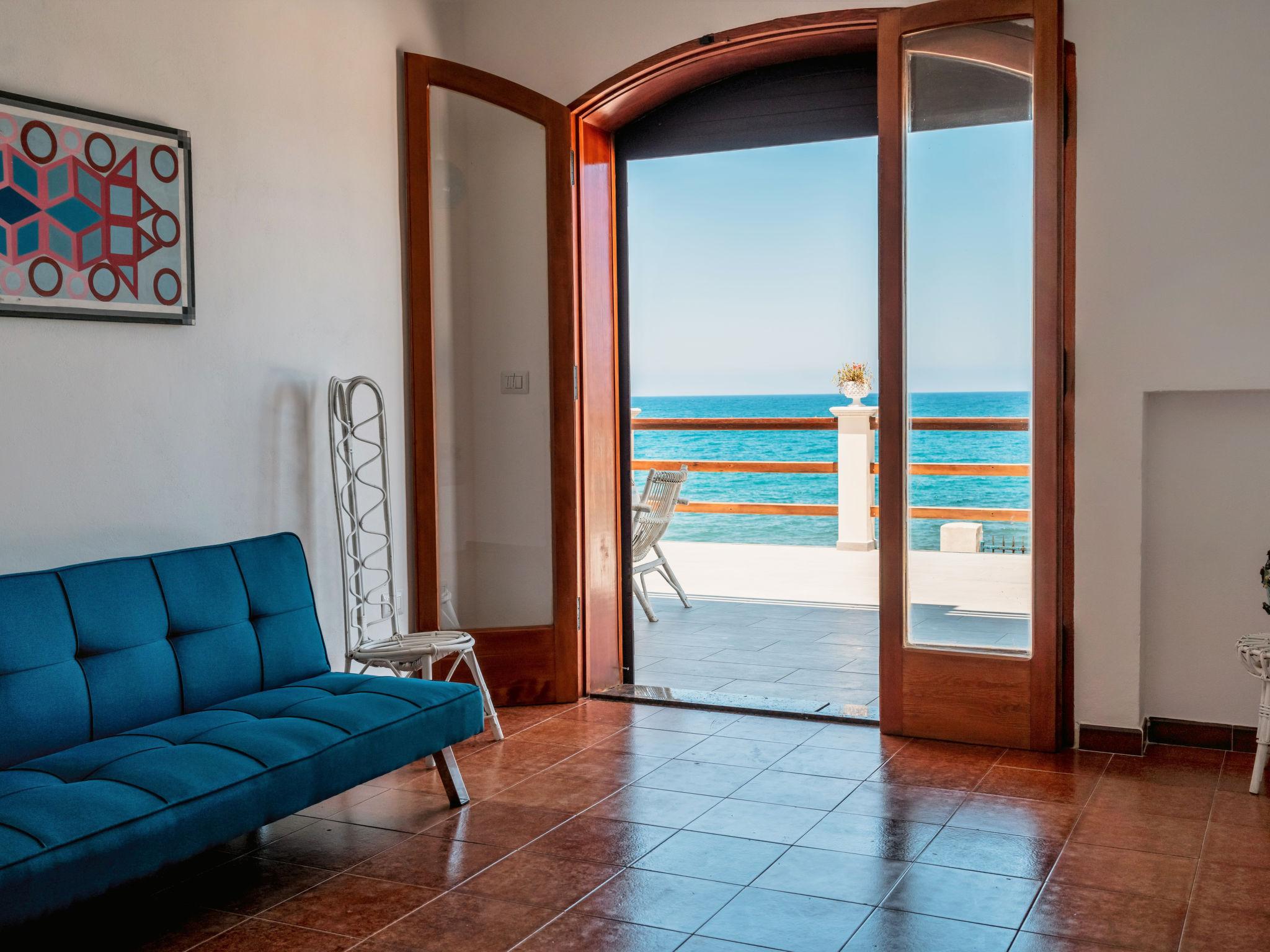 Photo 1 - Appartement de 1 chambre à Caronia avec terrasse et vues à la mer
