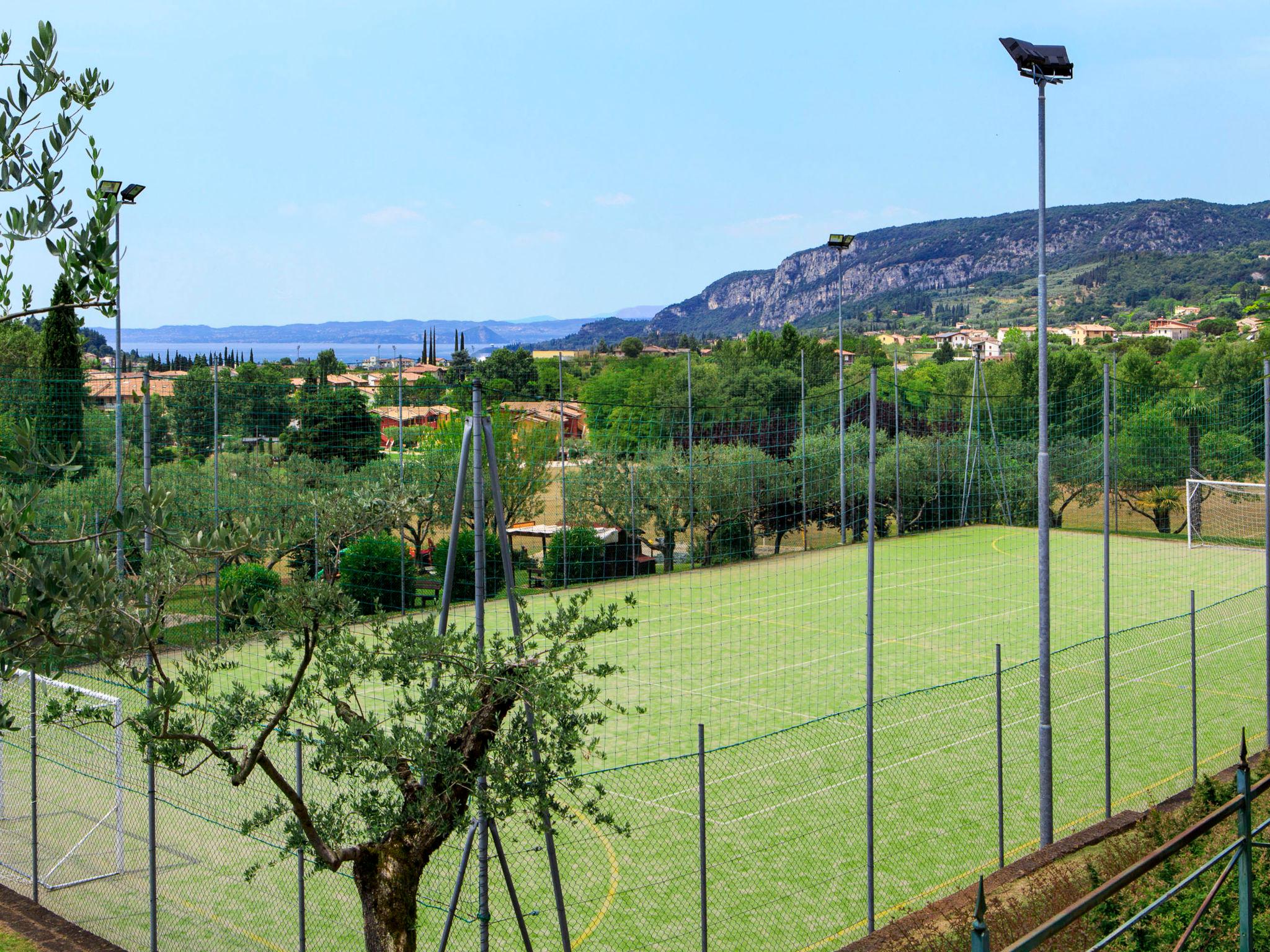 Foto 32 - Apartamento de 1 quarto em Costermano sul Garda com piscina e jardim