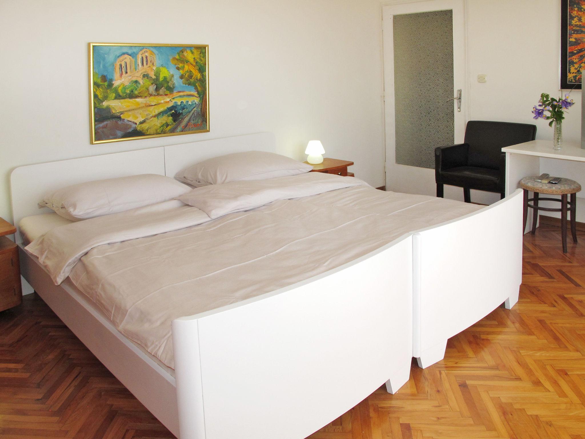 Foto 9 - Appartamento con 2 camere da letto a Opatija con giardino e vista mare