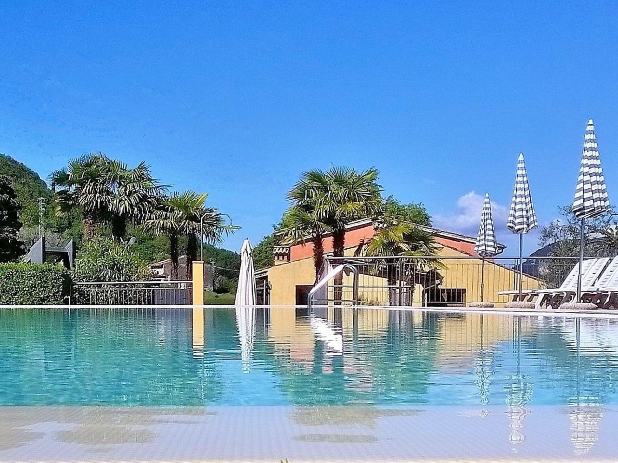 Photo 1 - Appartement de 2 chambres à Garda avec piscine et vues sur la montagne