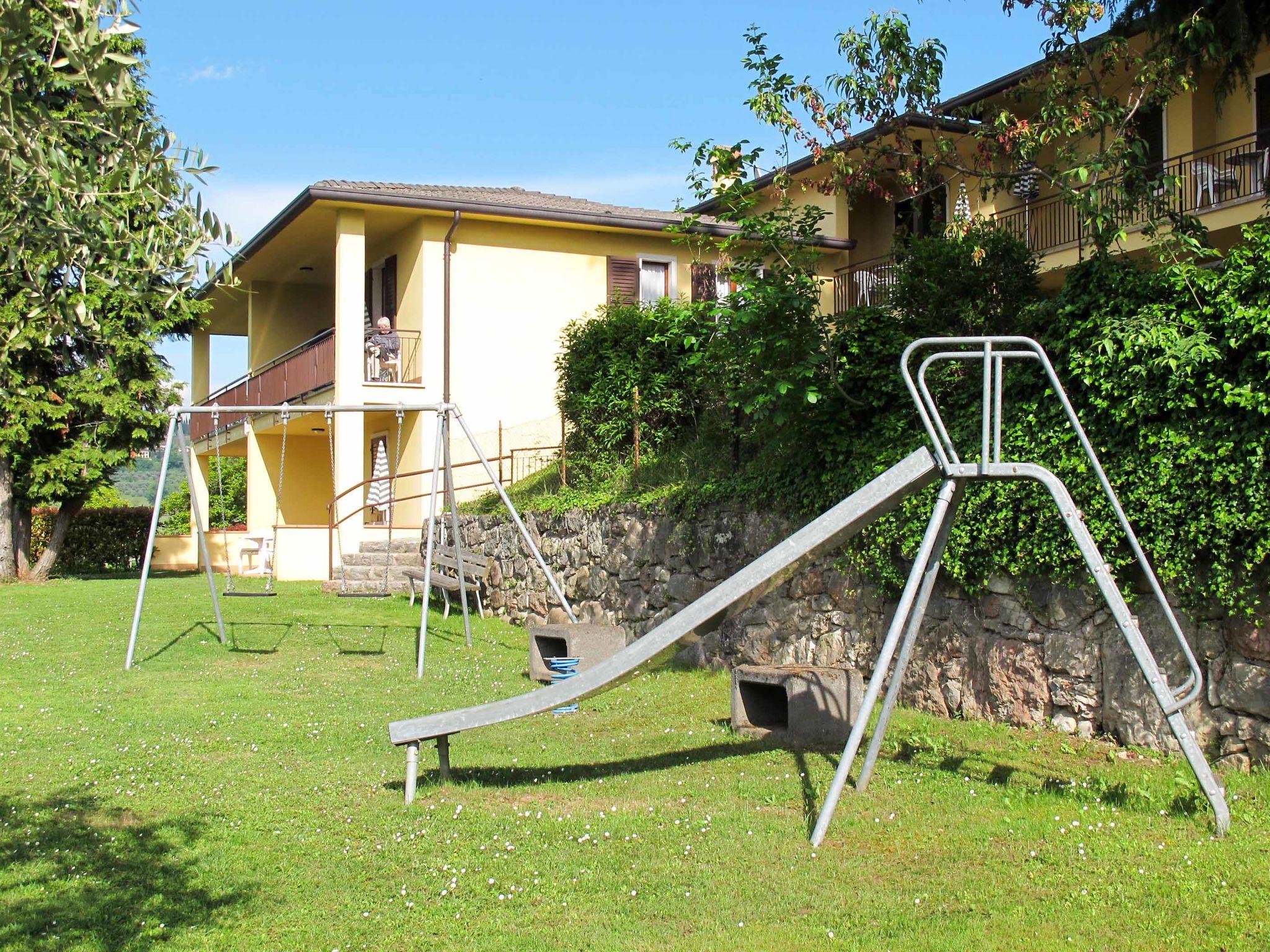 Photo 38 - Appartement de 2 chambres à Garda avec piscine et vues sur la montagne