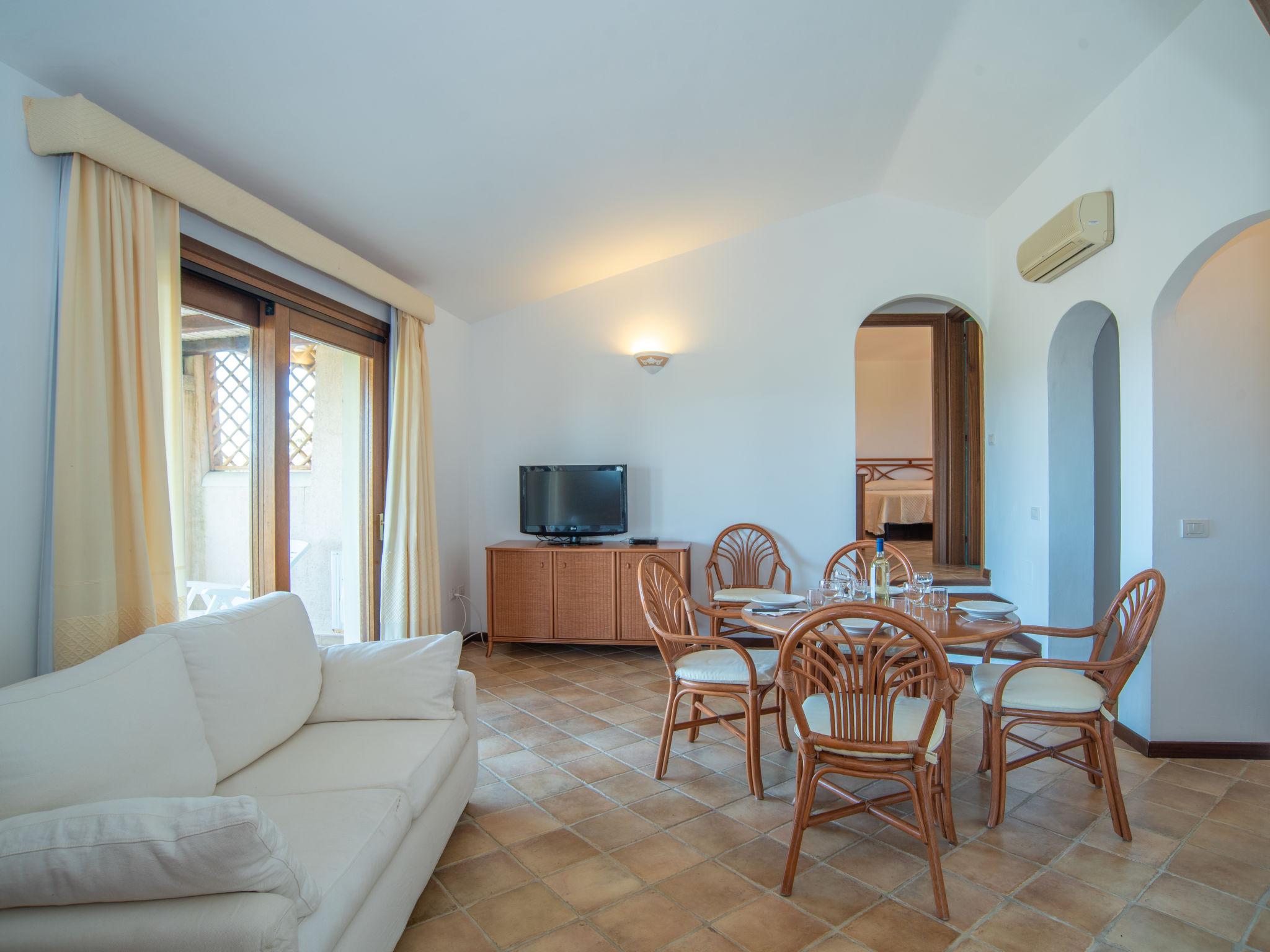 Photo 5 - 2 bedroom House in Loiri Porto San Paolo with swimming pool and garden