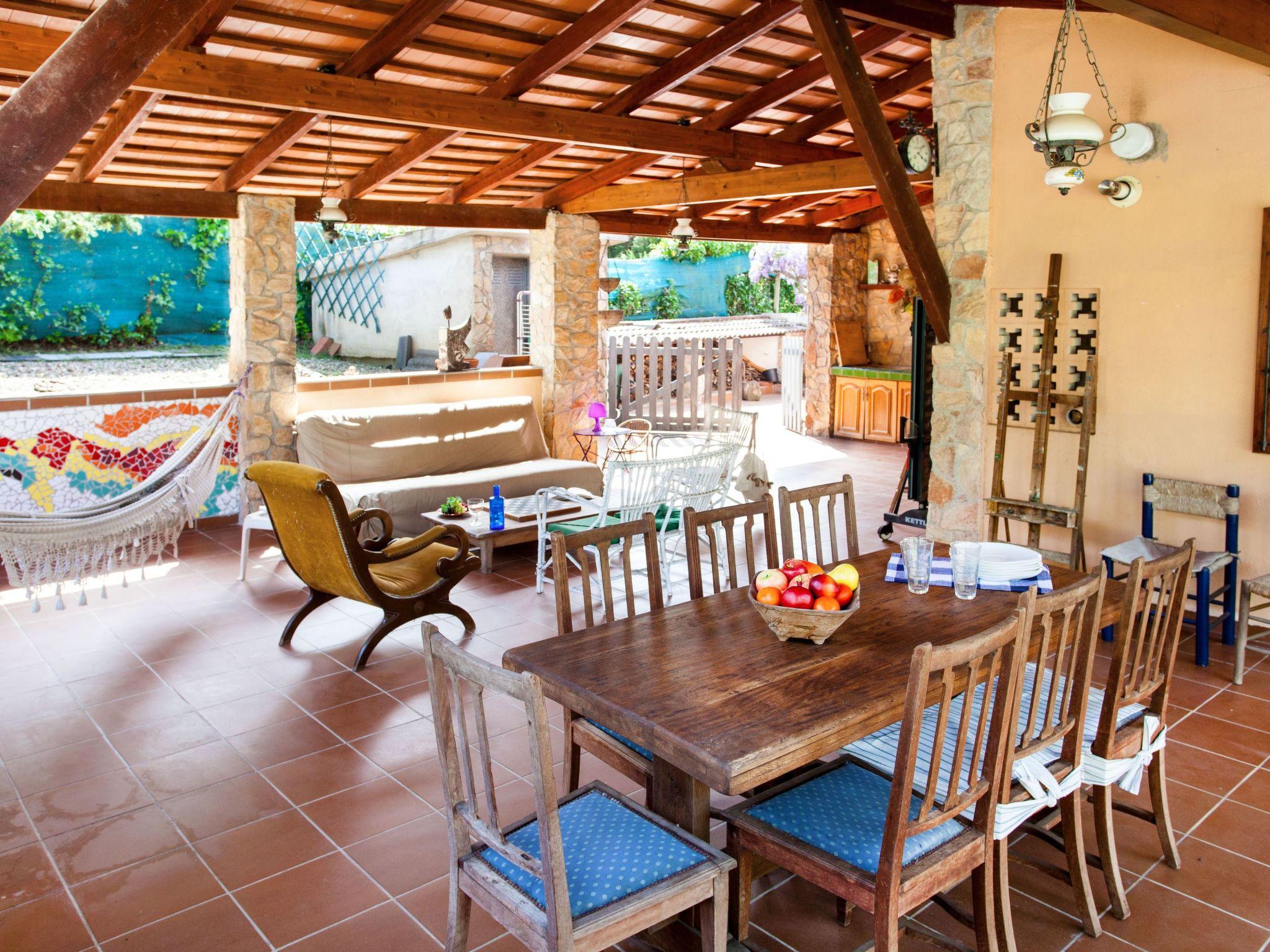 Foto 3 - Casa con 3 camere da letto a Caldes de Malavella con piscina privata e vista mare
