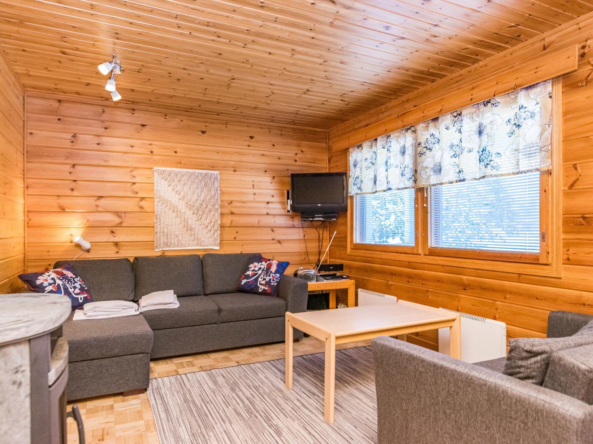 Foto 4 - Casa de 1 habitación en Puolanka con sauna y vistas a la montaña