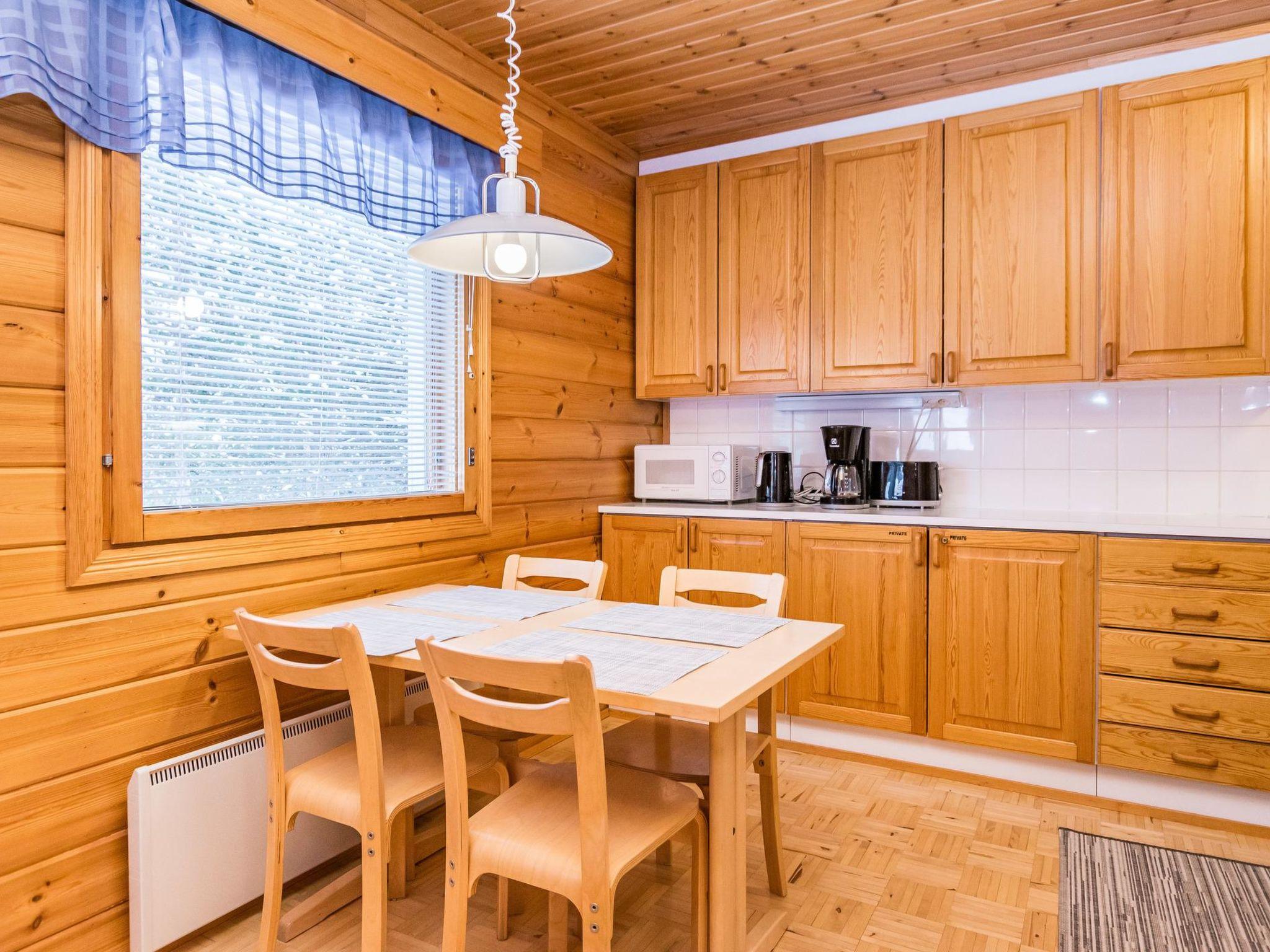 Foto 8 - Casa de 1 habitación en Puolanka con sauna y vistas a la montaña