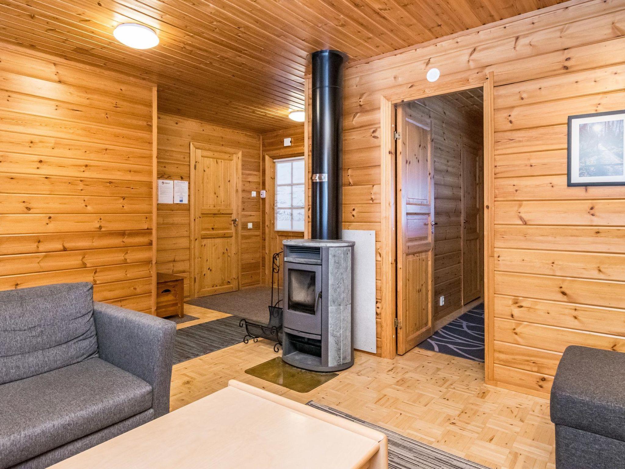 Foto 6 - Casa de 1 habitación en Puolanka con sauna y vistas a la montaña