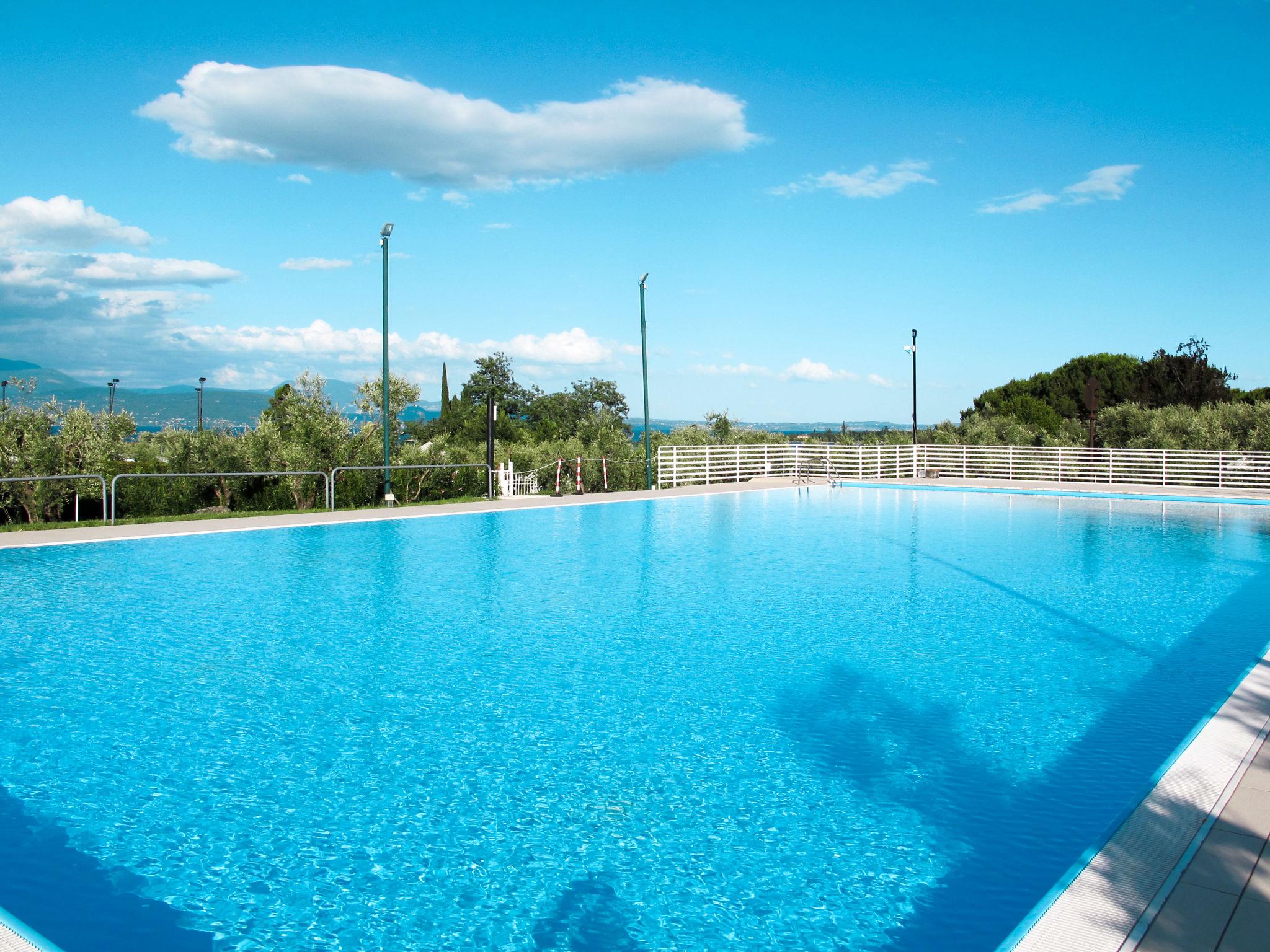 Foto 16 - Apartamento de 2 quartos em Manerba del Garda com piscina e jardim