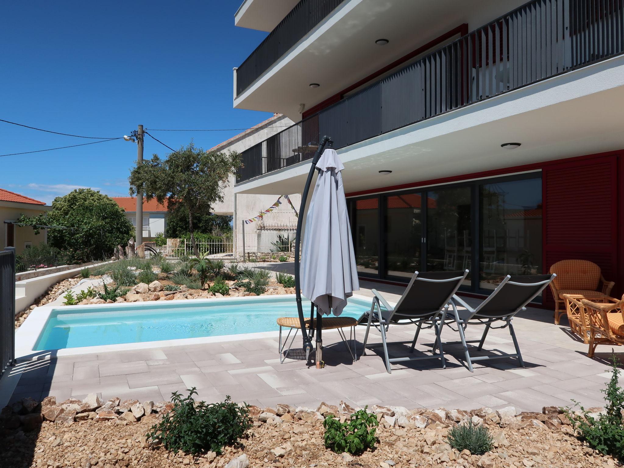 Photo 6 - Appartement de 2 chambres à Seget avec piscine et jardin