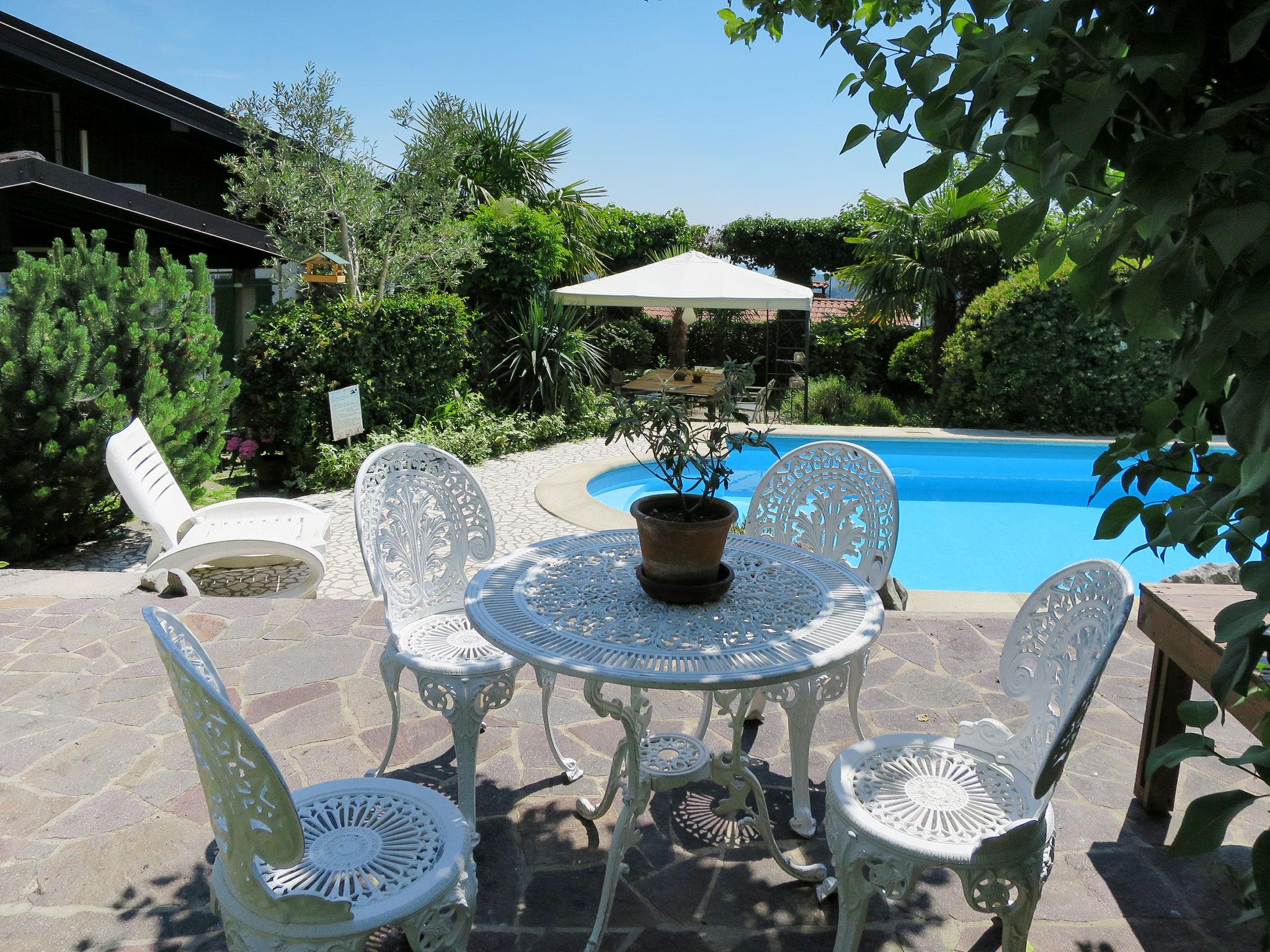 Foto 16 - Apartamento en Vito d'Asio con piscina y jardín