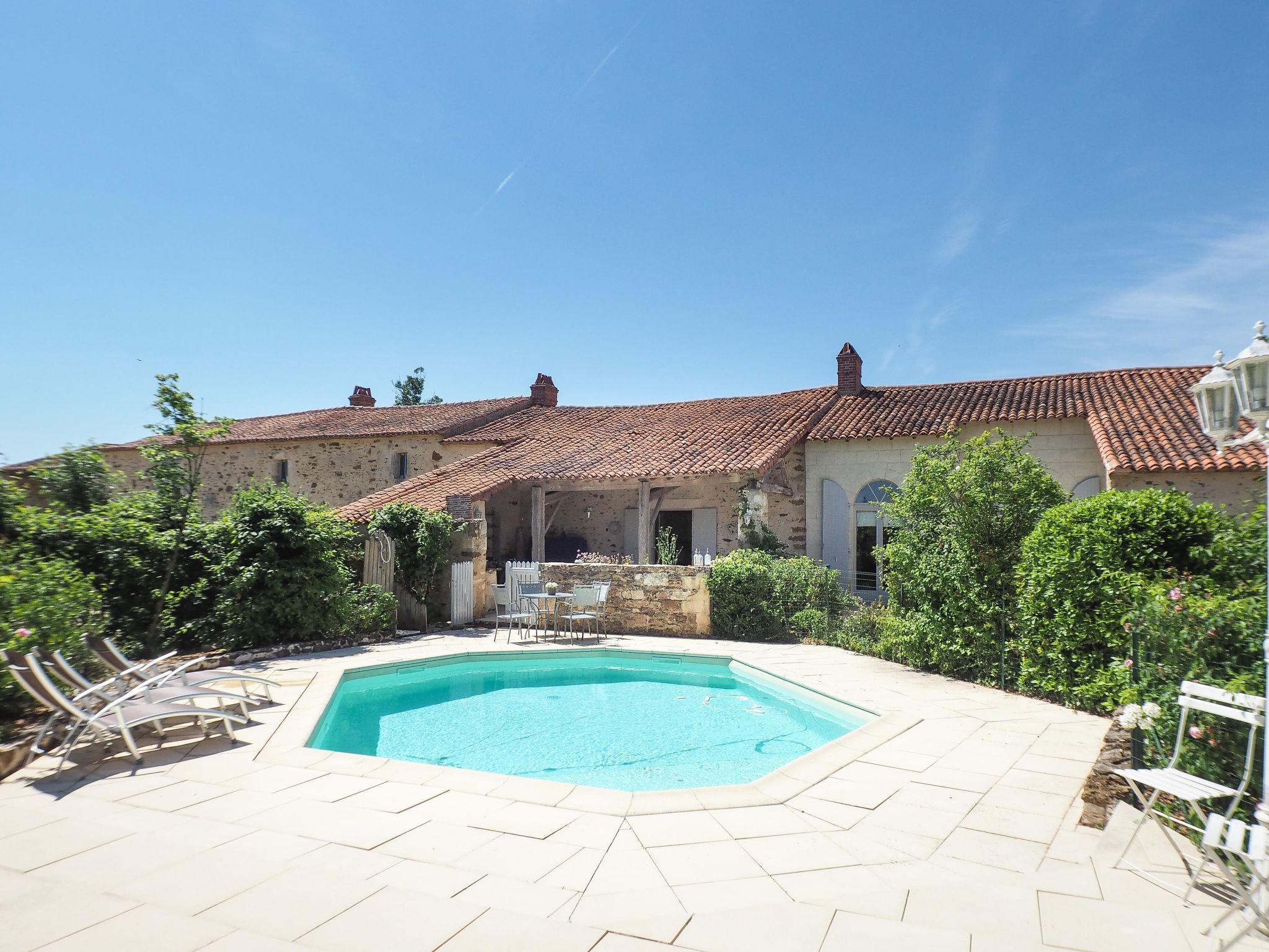 Photo 1 - Maison de 3 chambres à Saint-Laurent-de-la-Salle avec piscine et jardin