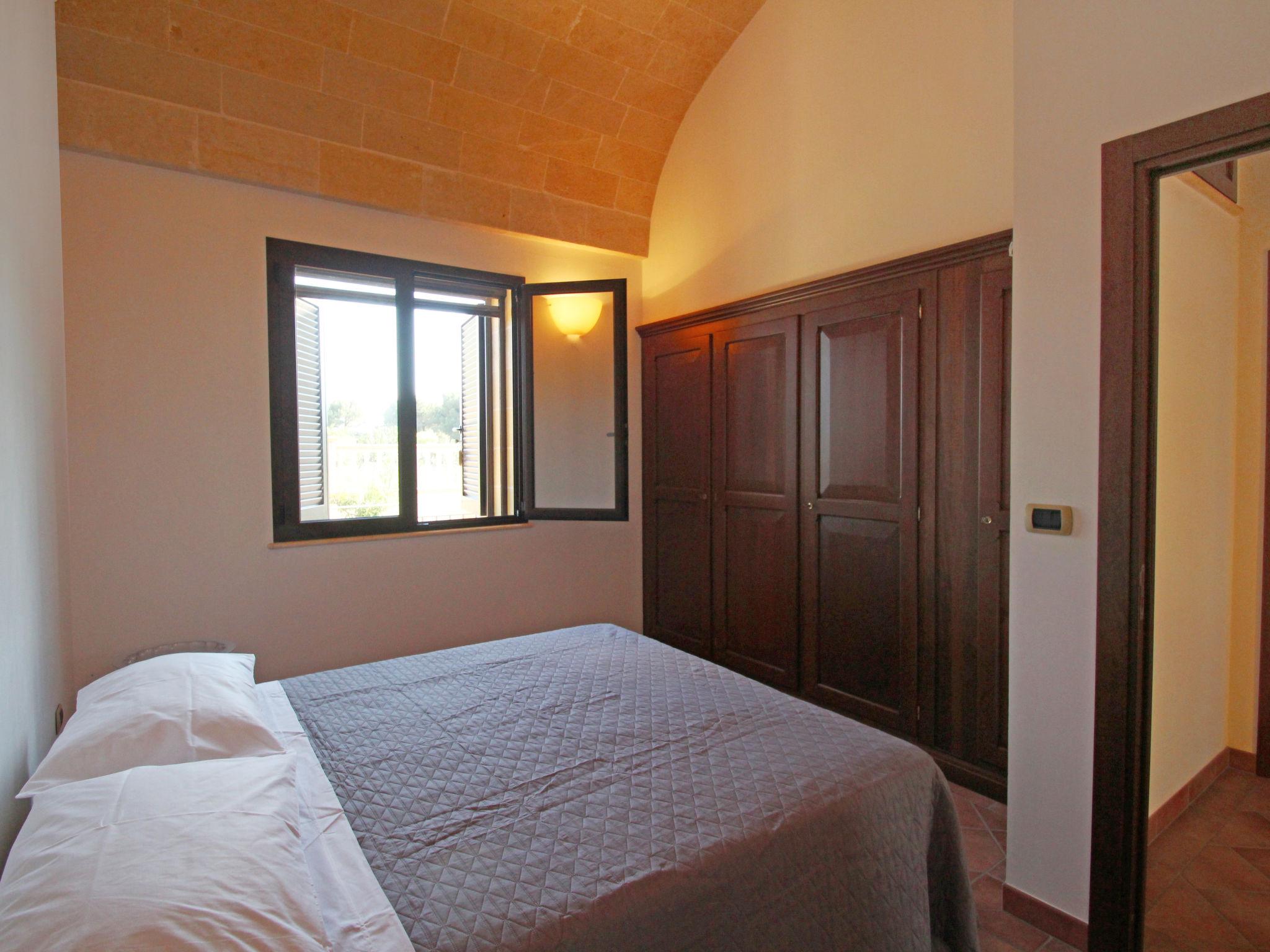 Foto 10 - Casa de 5 habitaciones en Torricella con jardín y vistas al mar