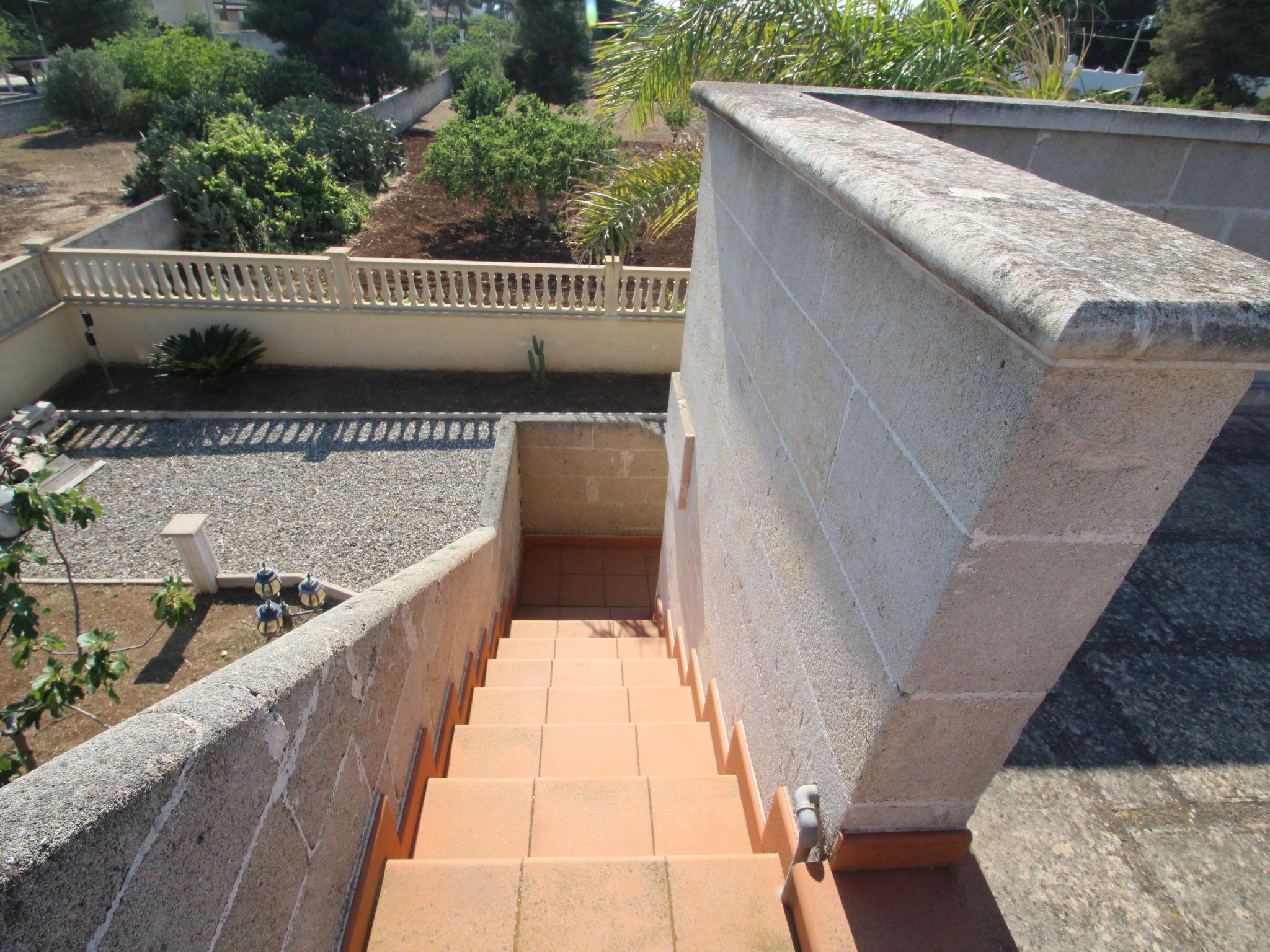 Photo 32 - Maison de 5 chambres à Torricella avec jardin et vues à la mer