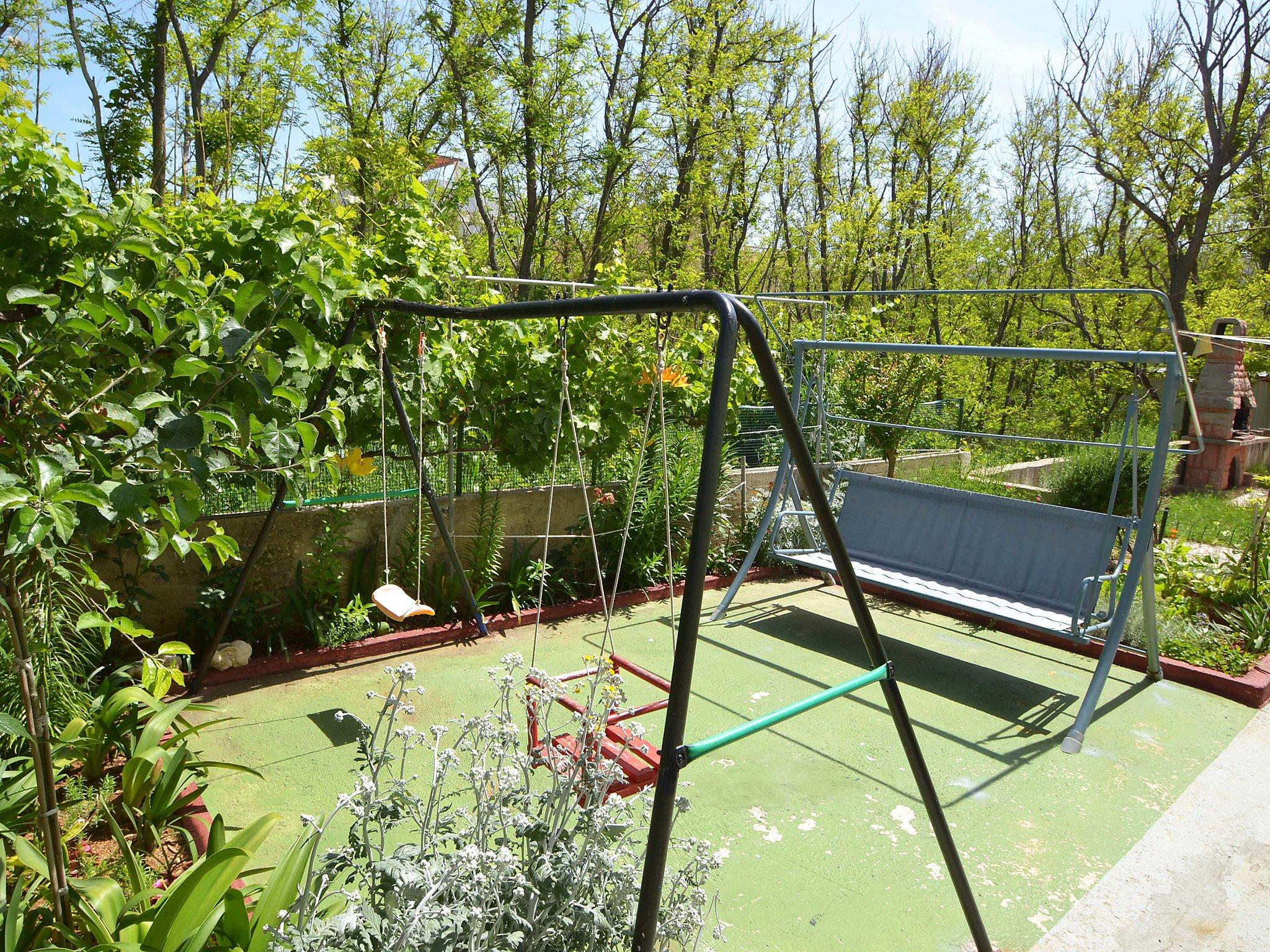 Photo 11 - Appartement en Pag avec jardin