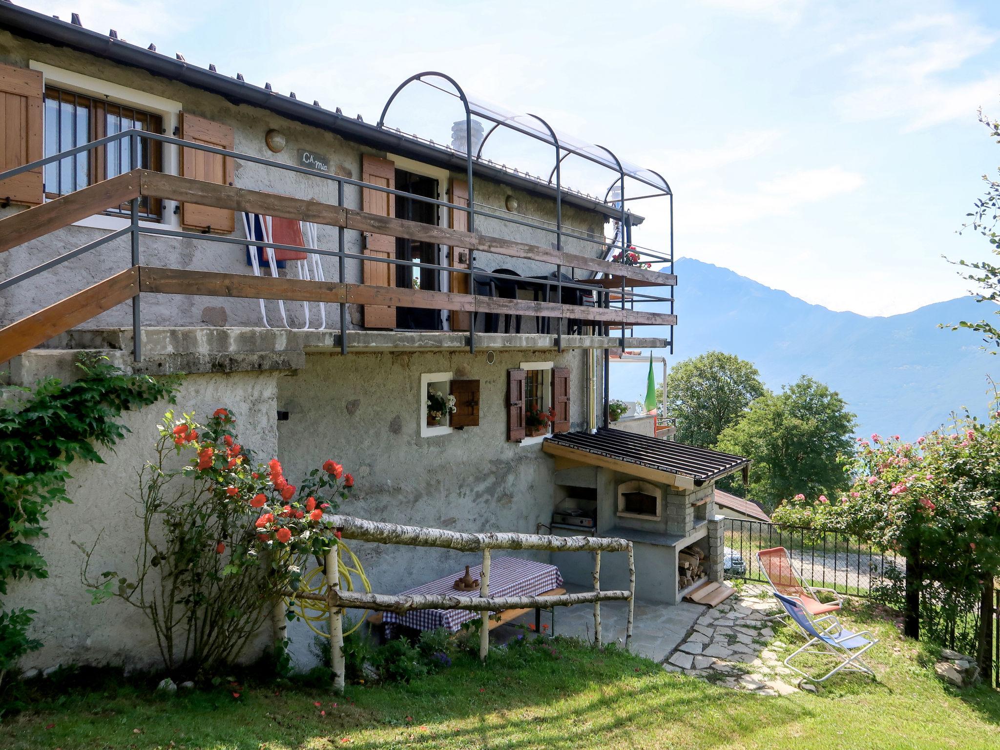 Photo 23 - Appartement de 2 chambres à Peglio avec jardin et vues sur la montagne