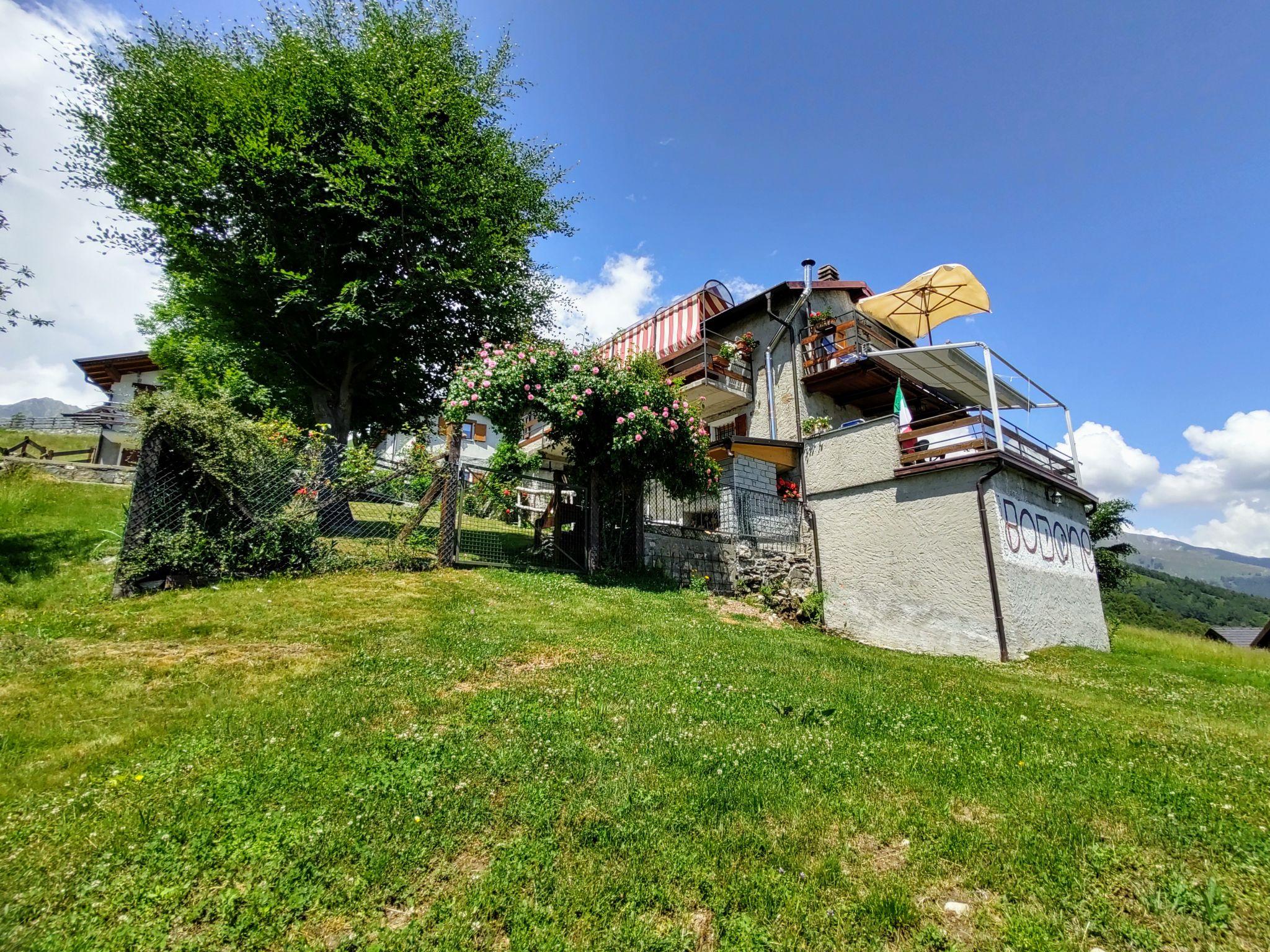 Photo 20 - Maison de 1 chambre à Peglio avec jardin et vues sur la montagne