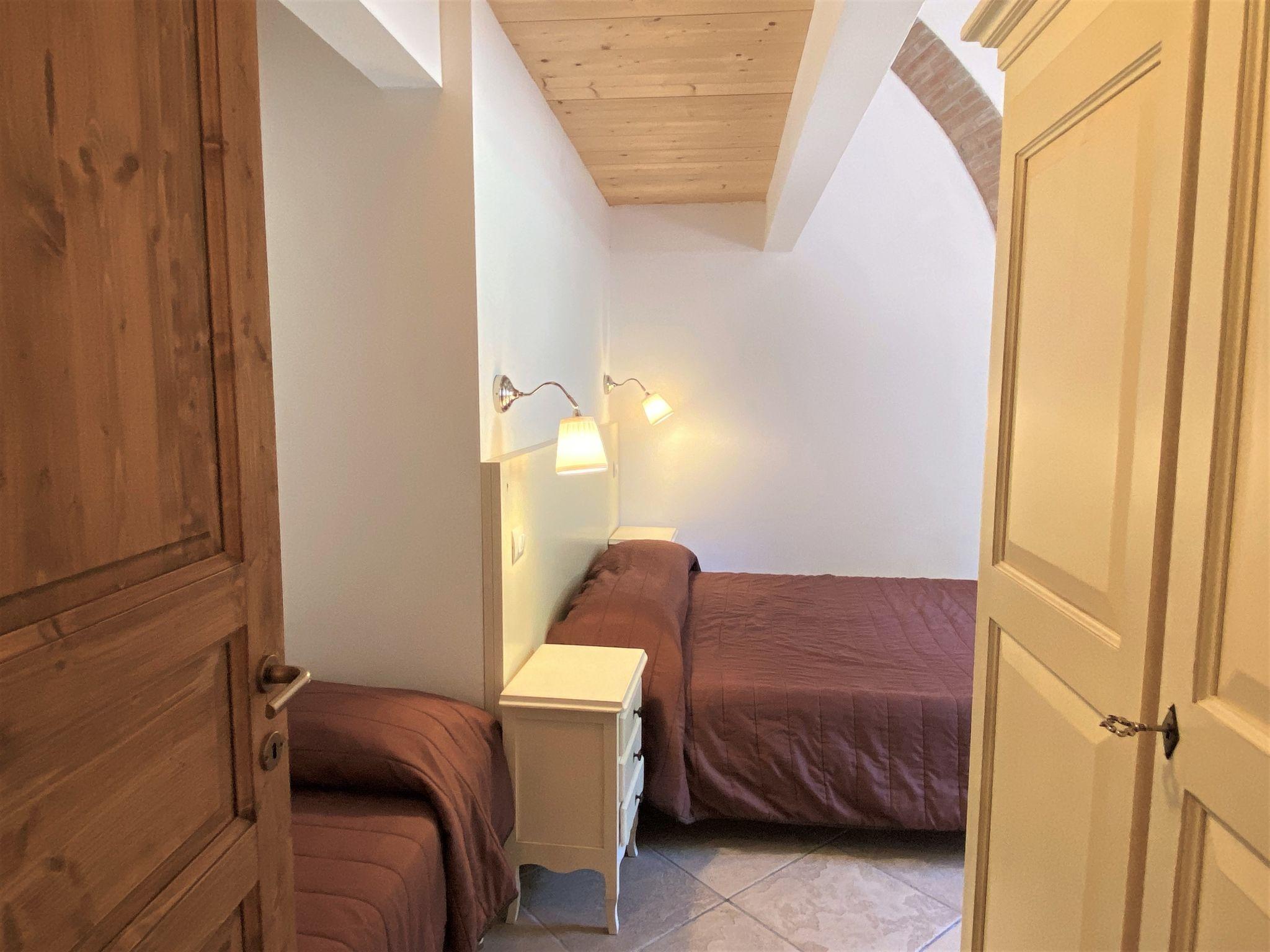 Foto 20 - Apartment mit 1 Schlafzimmer in Riparbella mit schwimmbad und garten