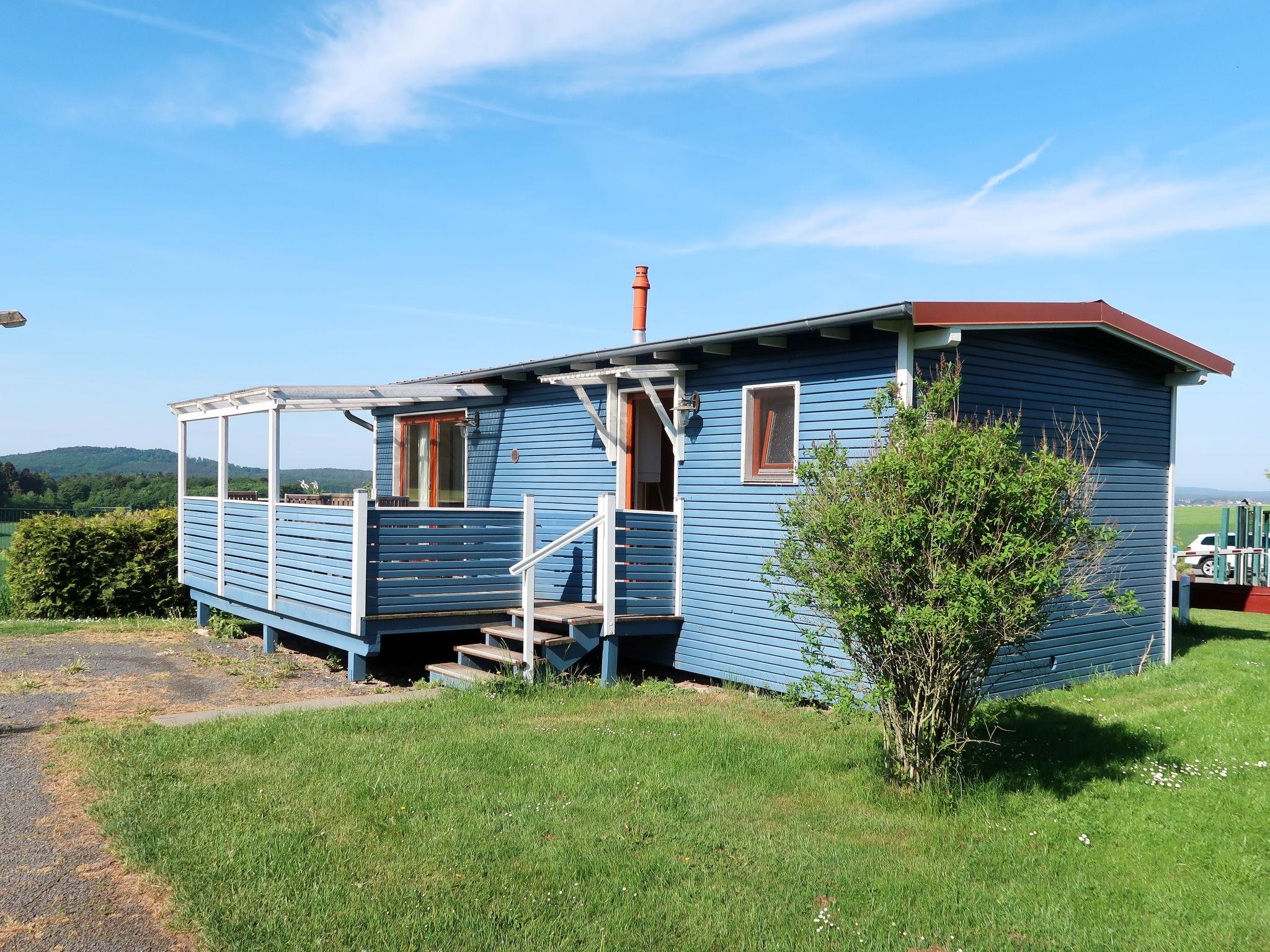 Photo 1 - Maison de 2 chambres à Bad Emstal avec piscine et vues sur la montagne