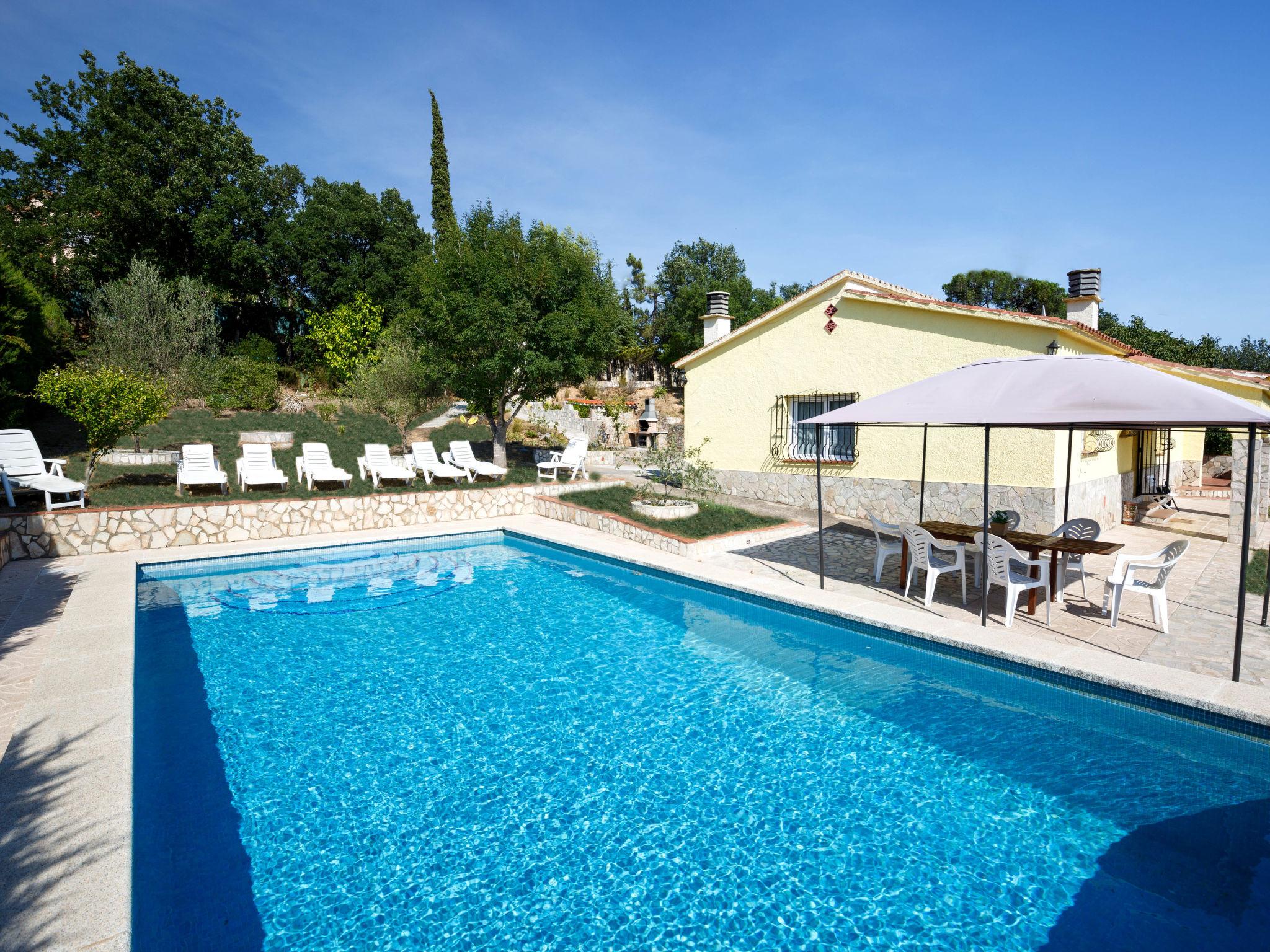 Photo 2 - Maison de 5 chambres à Vidreres avec piscine privée et vues à la mer