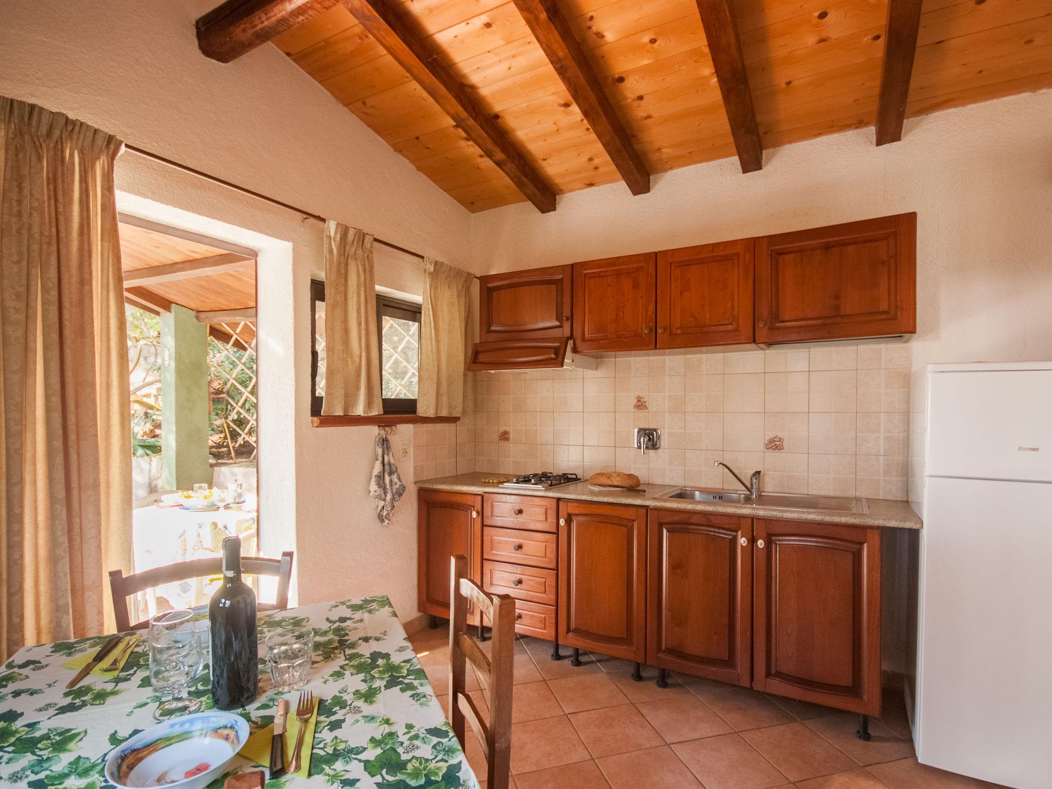 Photo 6 - Maison de 1 chambre à Capoliveri avec jardin et terrasse