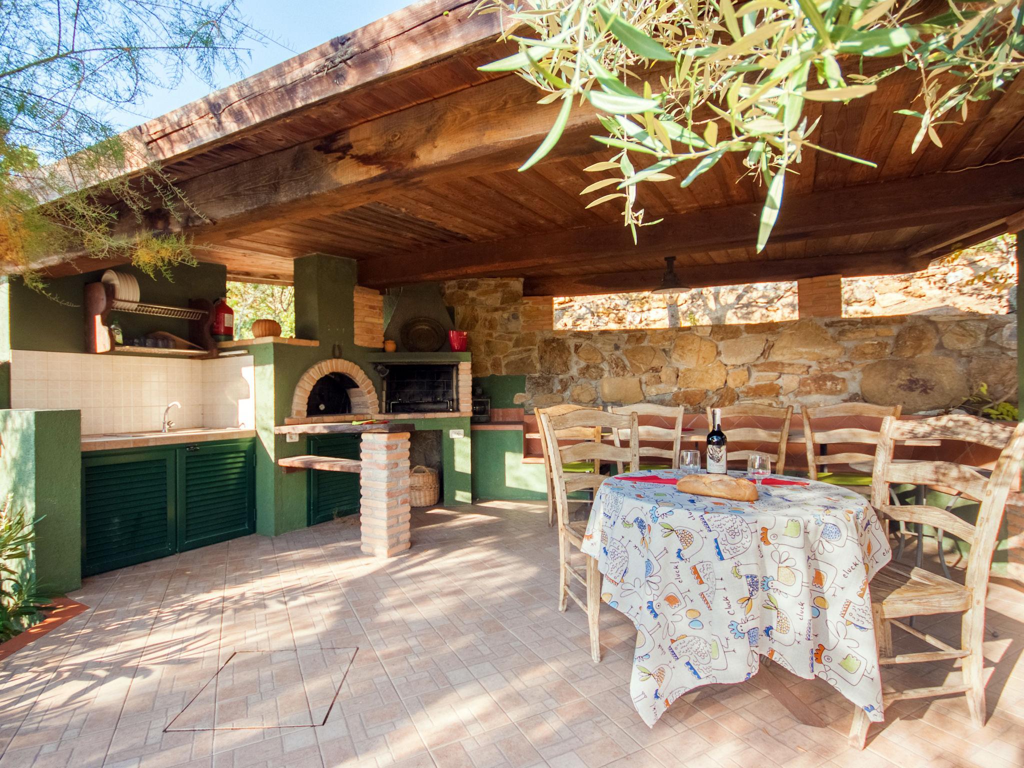 Photo 17 - Maison de 1 chambre à Capoliveri avec jardin et terrasse