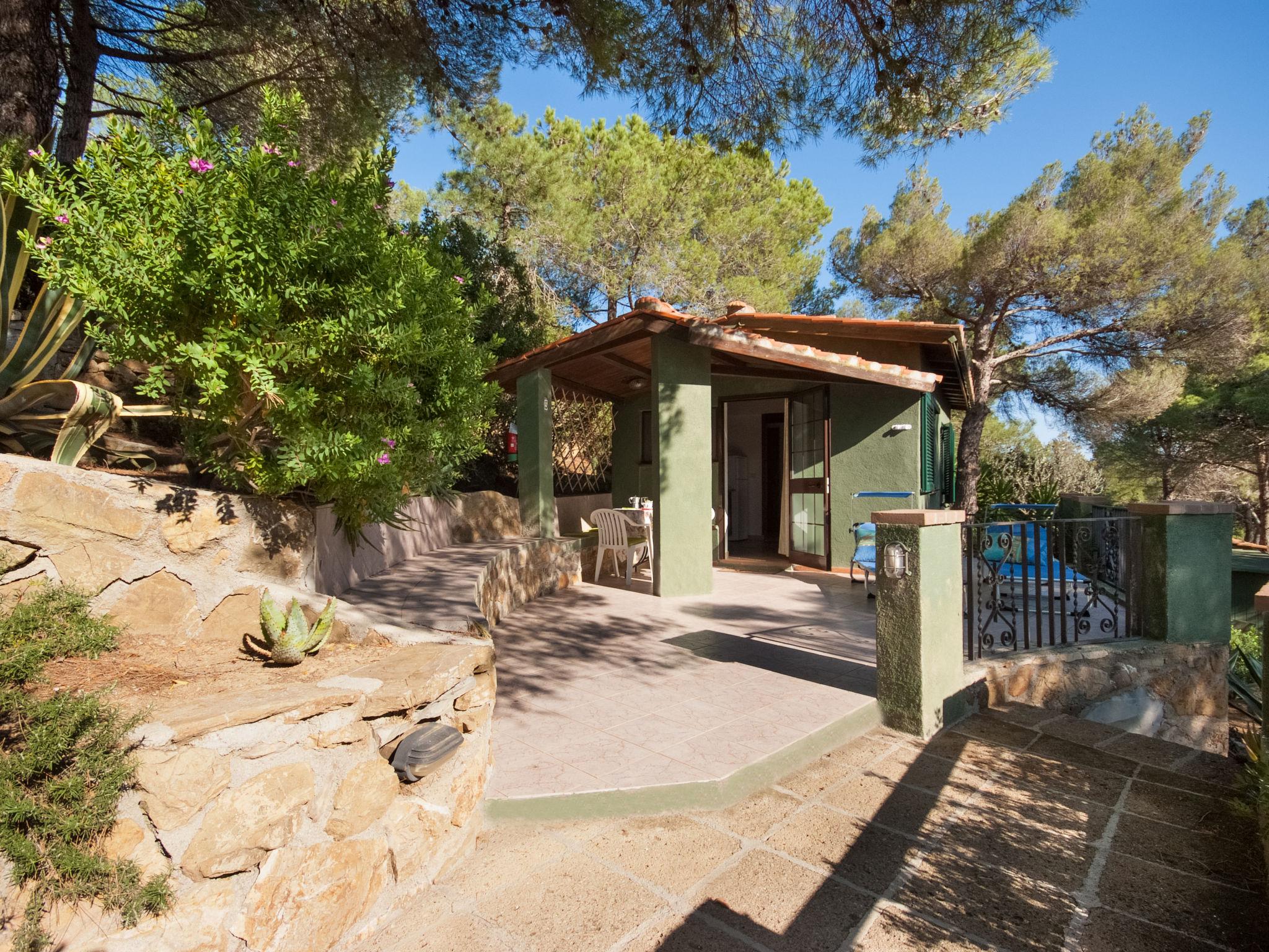 Foto 1 - Casa de 1 habitación en Capoliveri con jardín y vistas al mar