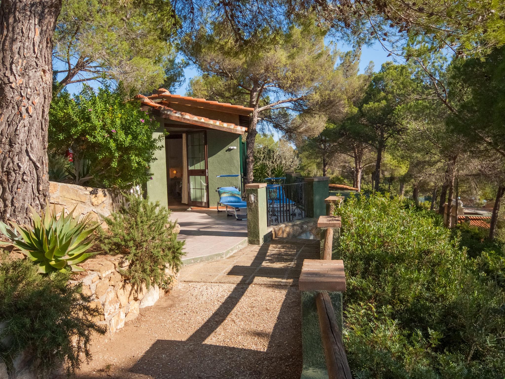 Photo 21 - Maison de 1 chambre à Capoliveri avec jardin et vues à la mer