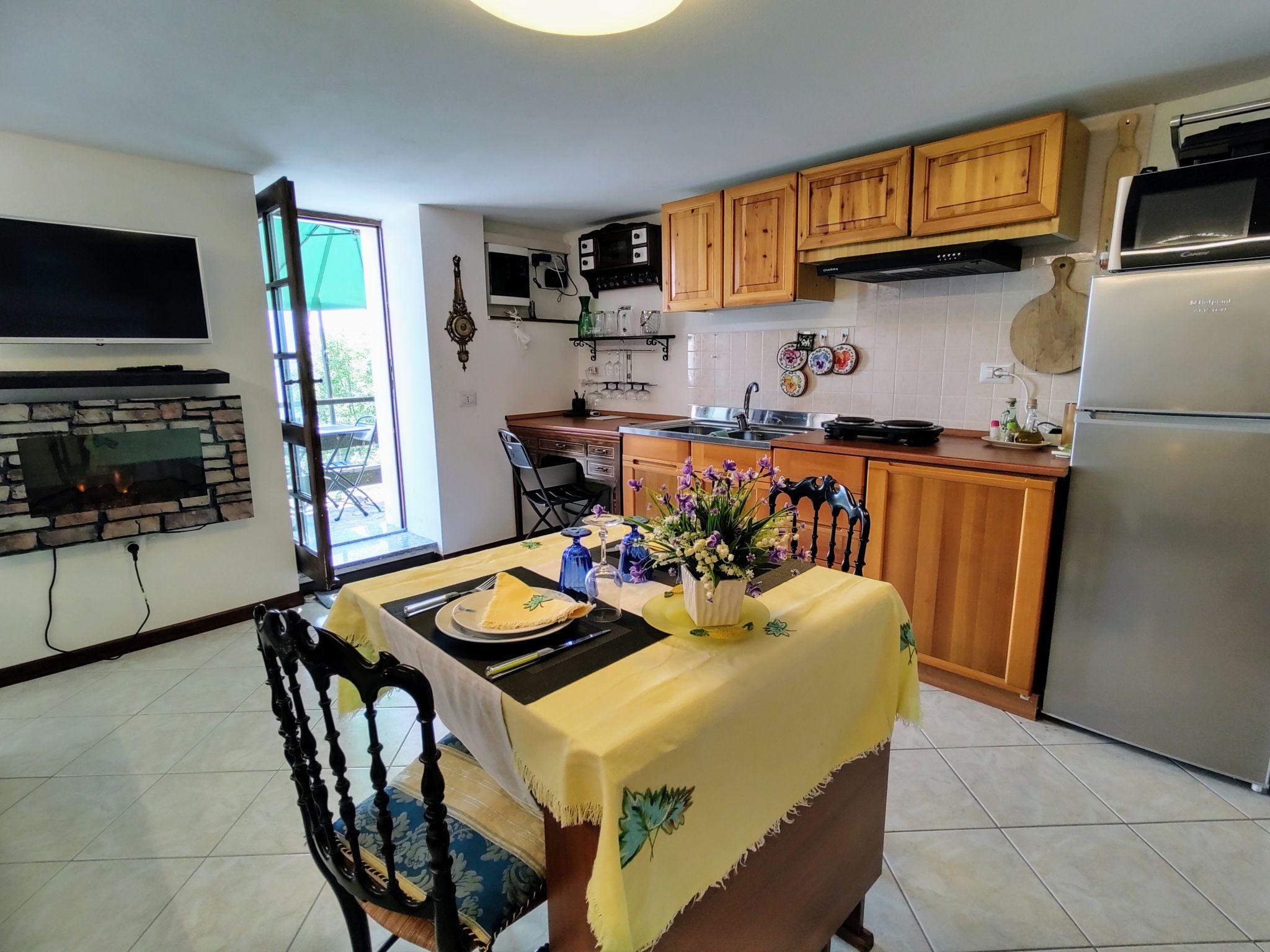 Photo 10 - Apartment in Peglio with garden and mountain view