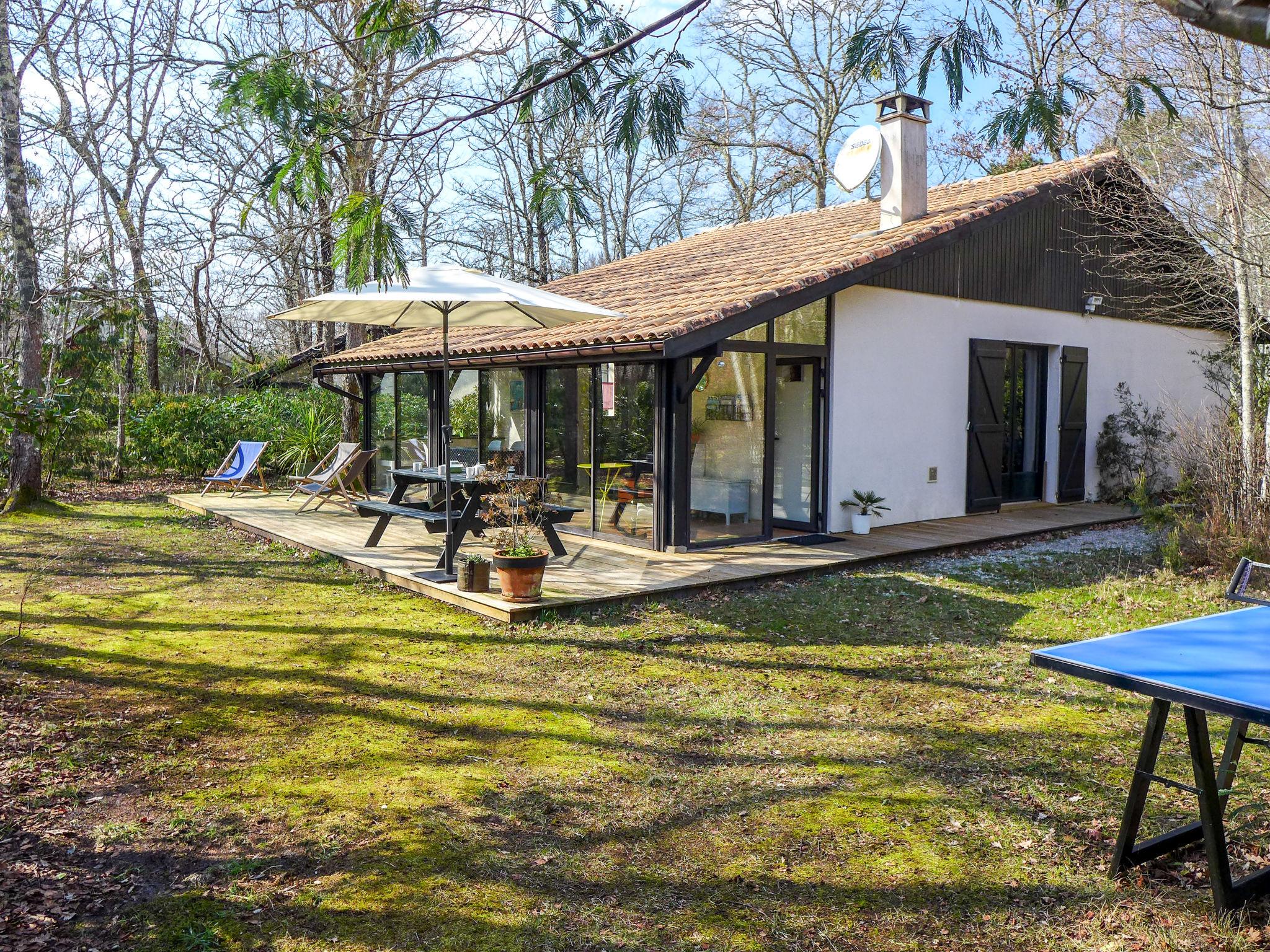 Foto 1 - Casa con 2 camere da letto a Lacanau con piscina e giardino