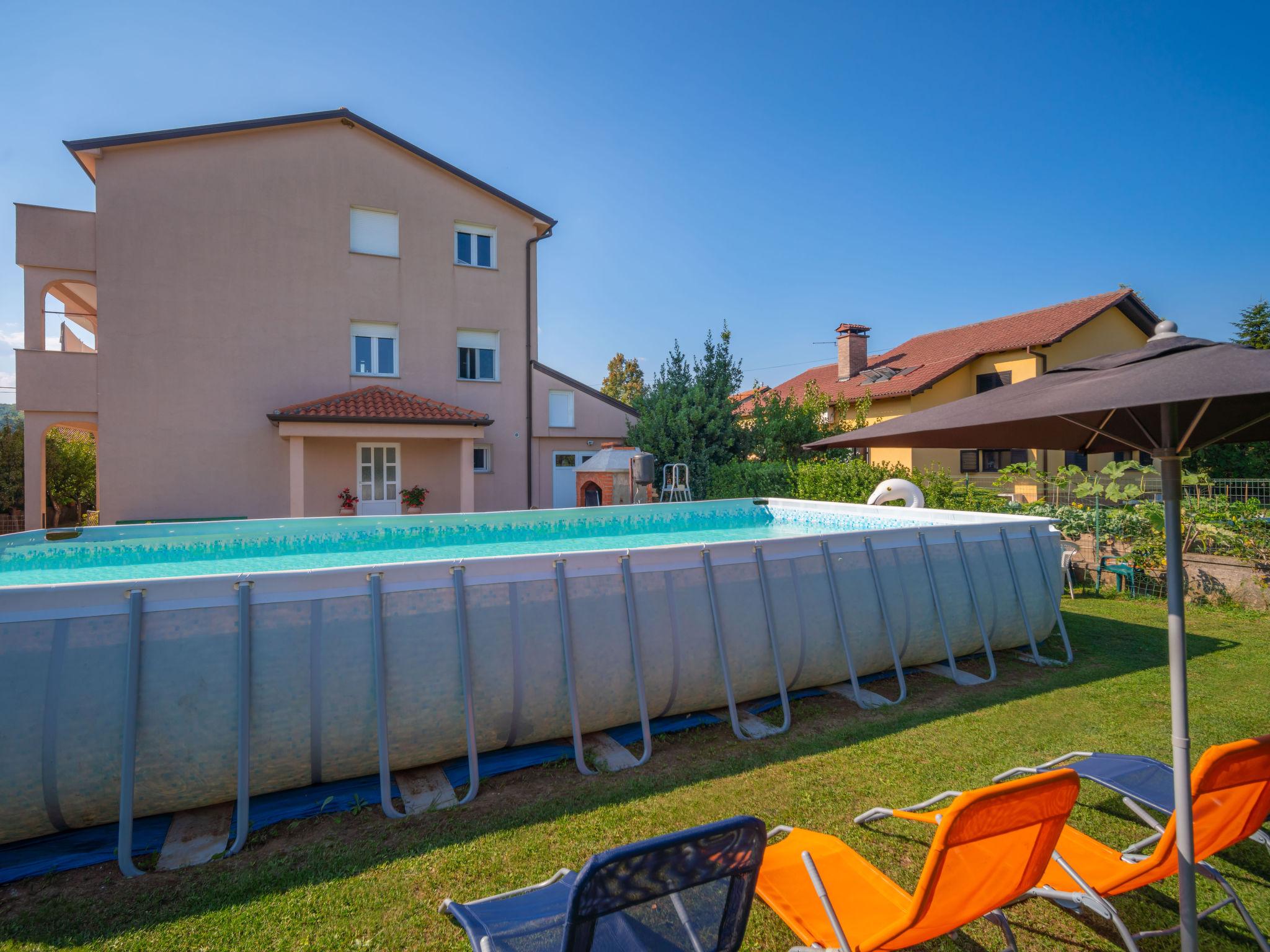 Foto 1 - Appartamento con 2 camere da letto a Jelenje con piscina privata e vista mare