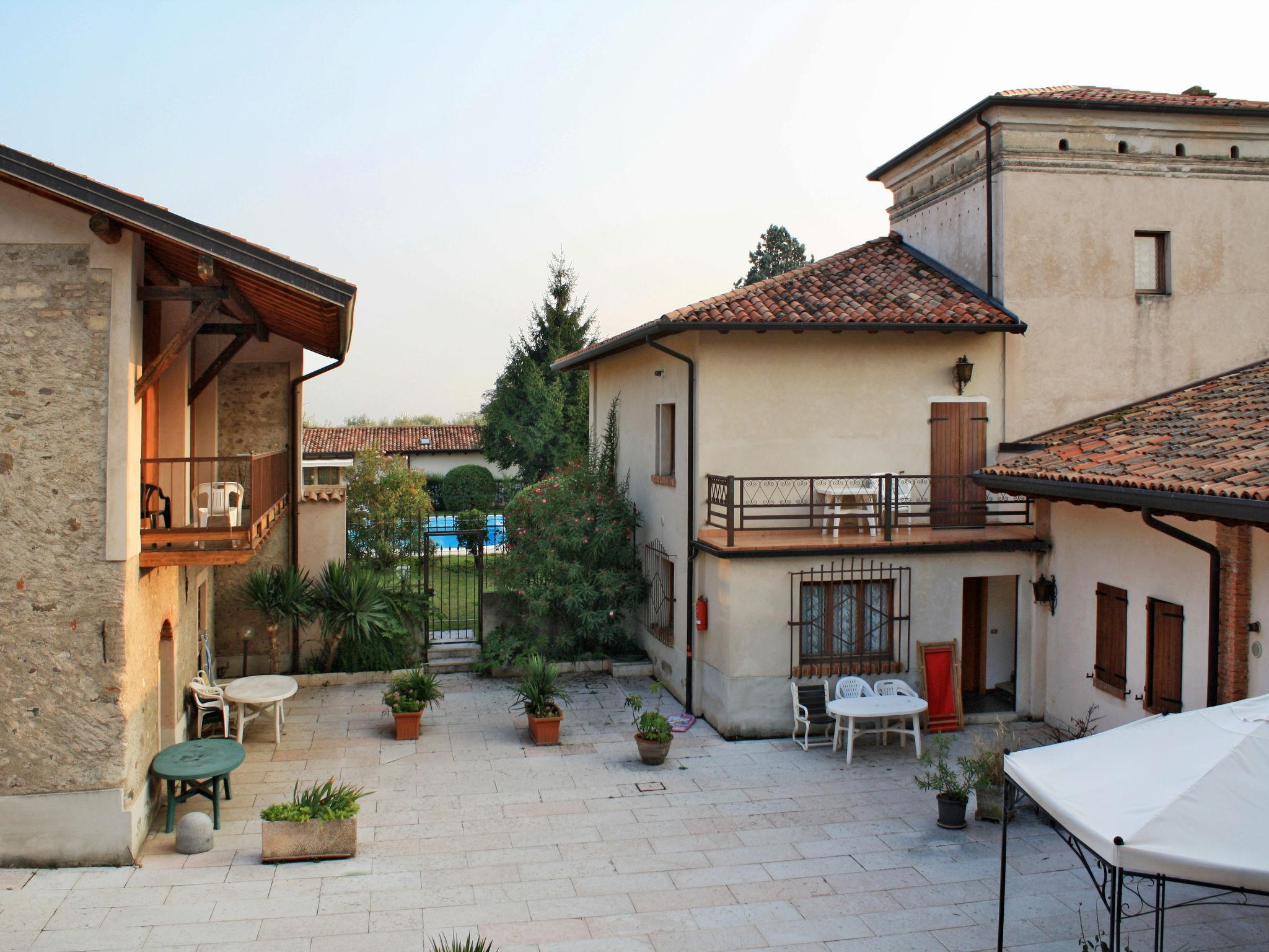 Foto 3 - Apartamento de 3 quartos em Salò com piscina e vista para a montanha