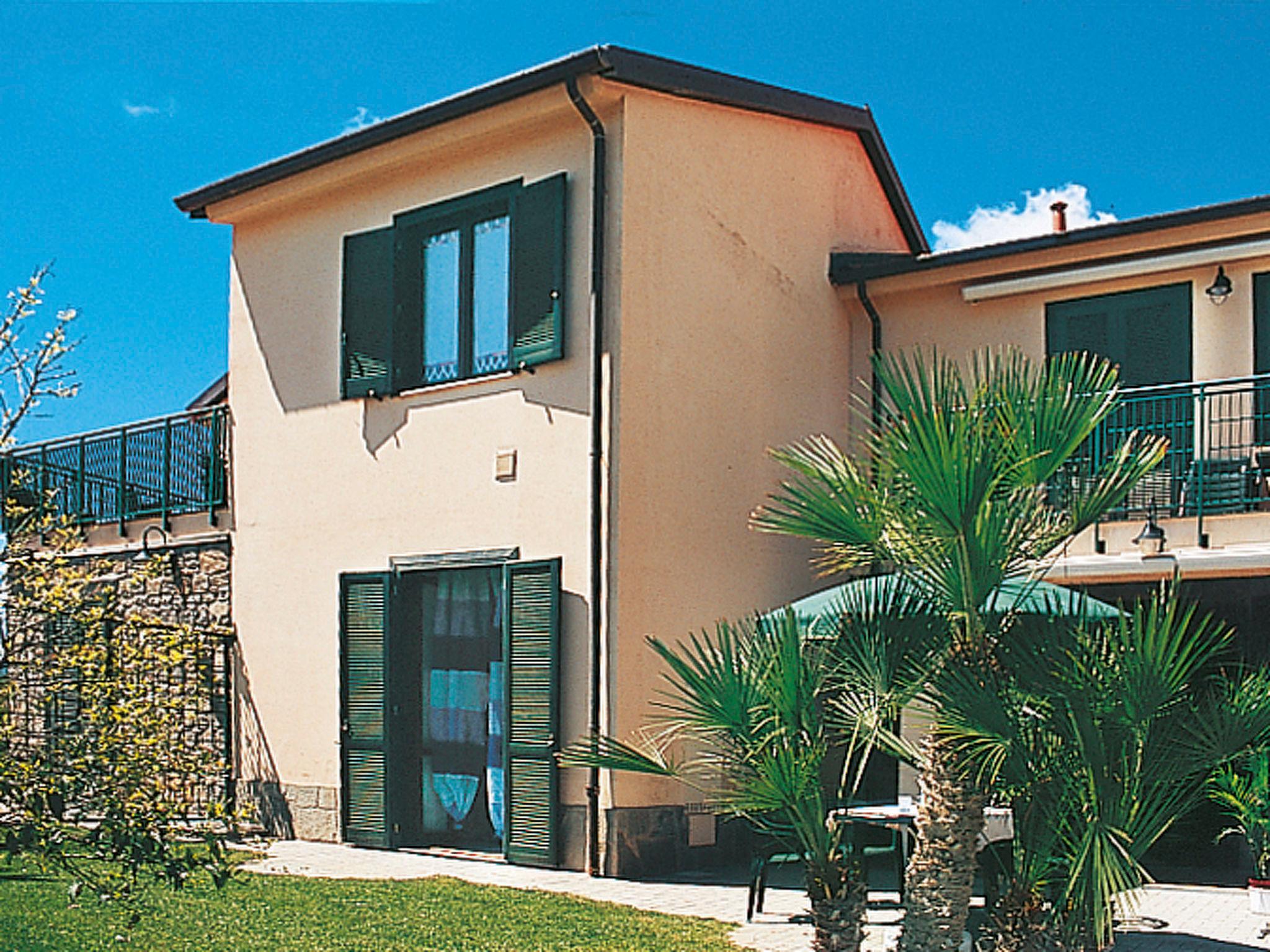 Photo 9 - Appartement de 3 chambres à Cipressa avec piscine et vues à la mer