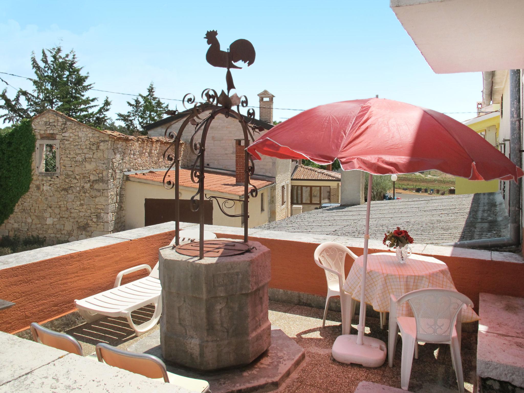 Foto 1 - Casa de 3 habitaciones en Poreč con terraza y vistas al mar