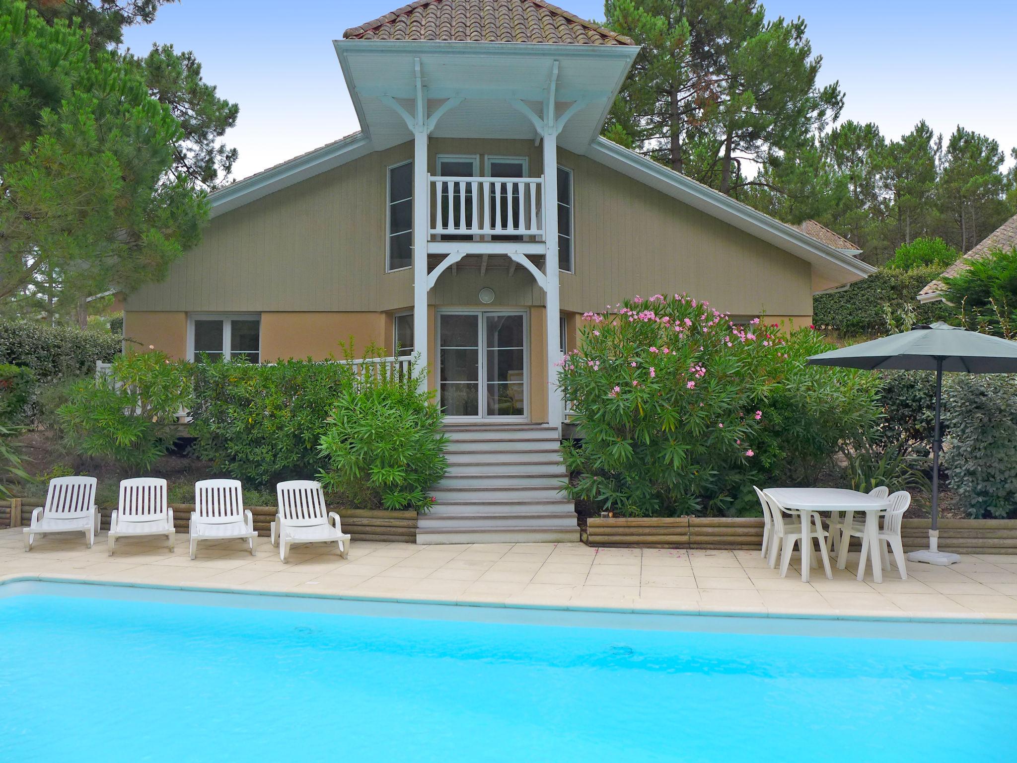 Foto 1 - Casa de 4 habitaciones en Lacanau con piscina privada y vistas al mar