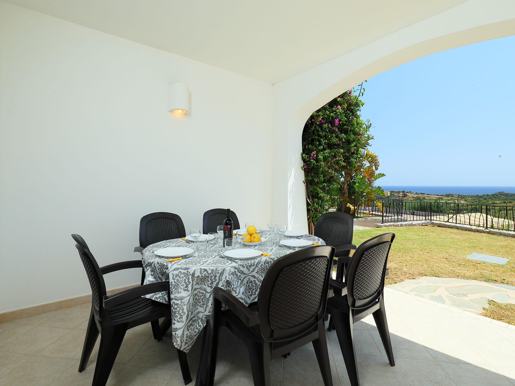 Photo 16 - Appartement de 2 chambres à Budoni avec piscine et vues à la mer