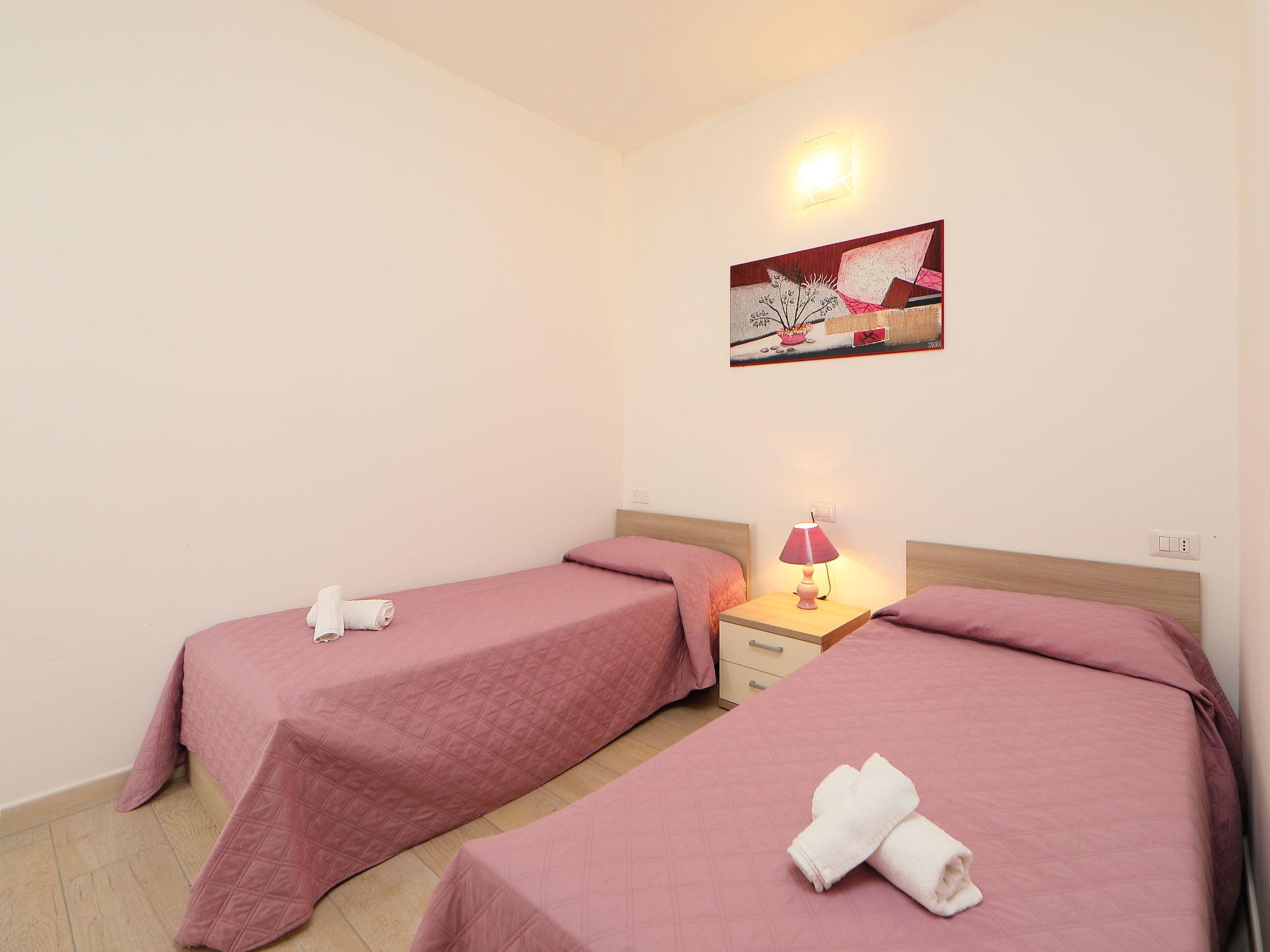 Foto 13 - Appartamento con 2 camere da letto a Budoni con piscina e vista mare
