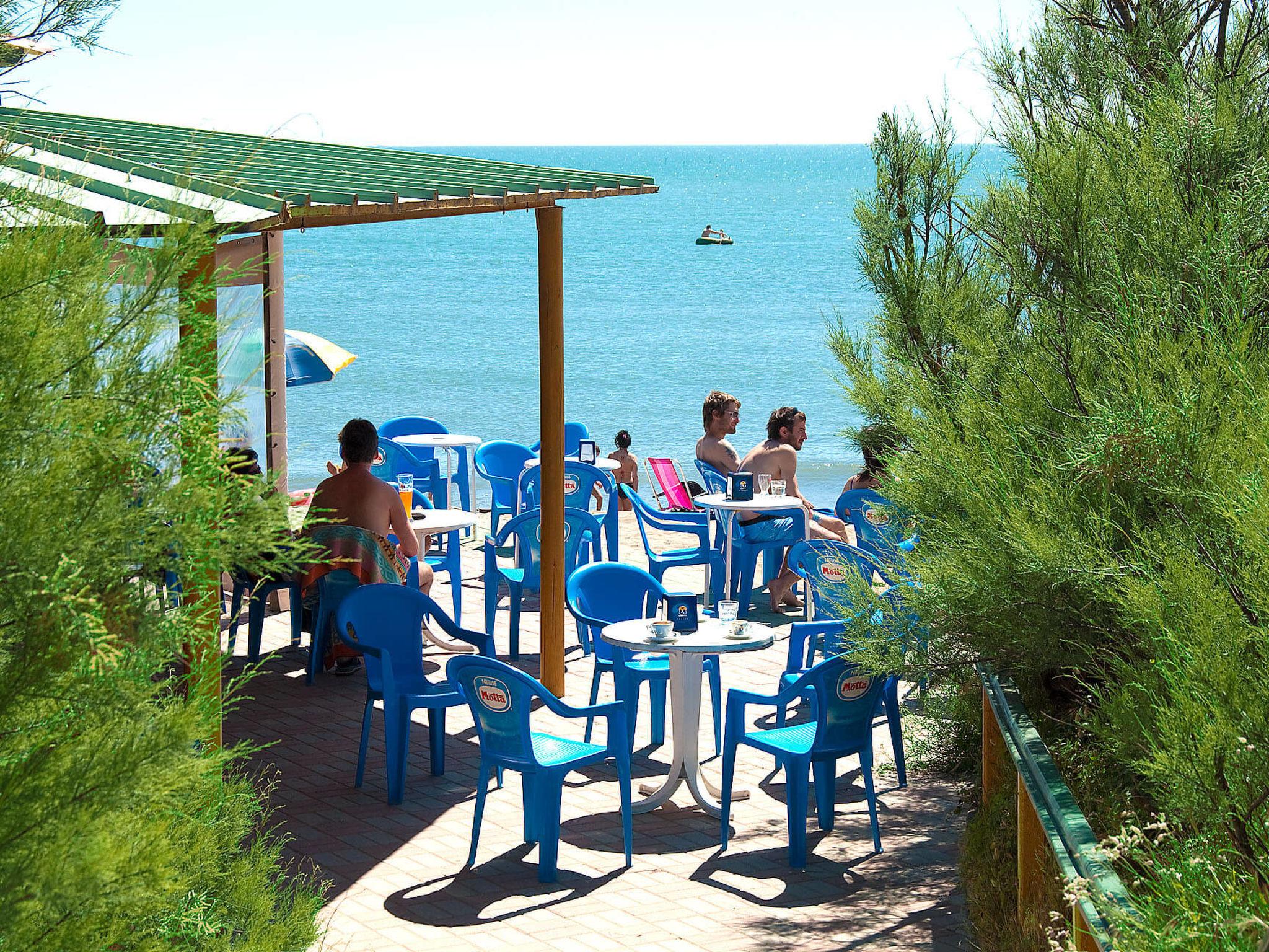 Photo 2 - Maison de 3 chambres à Rosolina avec piscine et vues à la mer