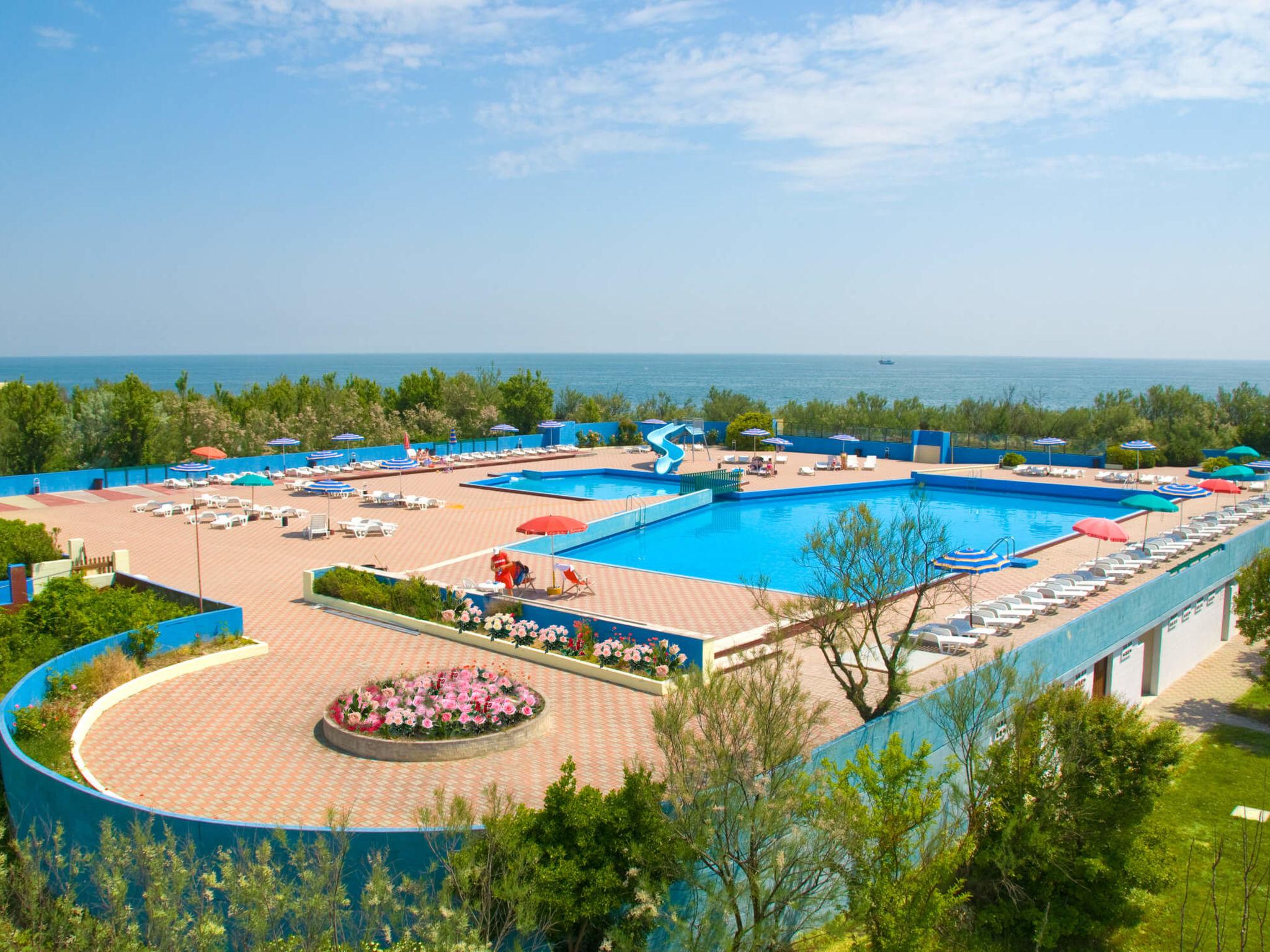 Photo 1 - Maison de 3 chambres à Rosolina avec piscine et vues à la mer