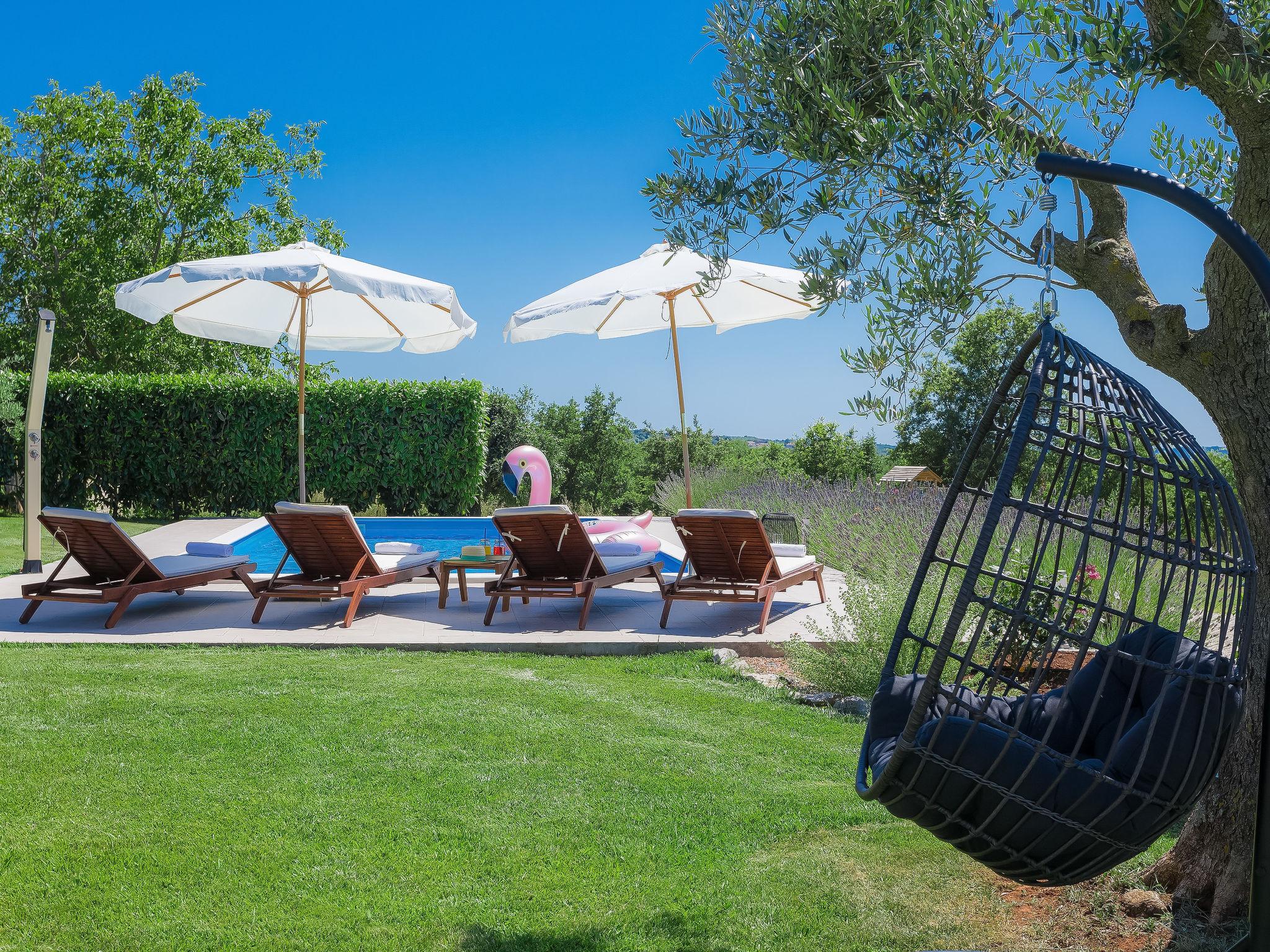 Photo 8 - Maison de 2 chambres à Sveti Lovreč avec piscine privée et jardin