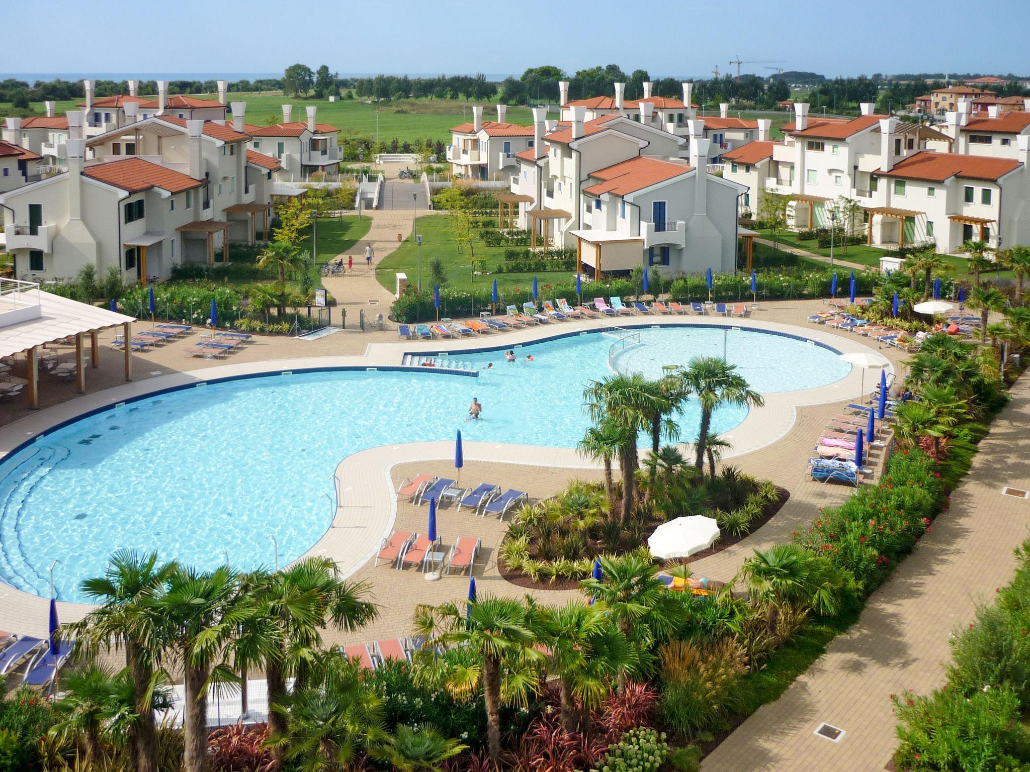 Photo 10 - Maison de 2 chambres à Caorle avec piscine et vues à la mer