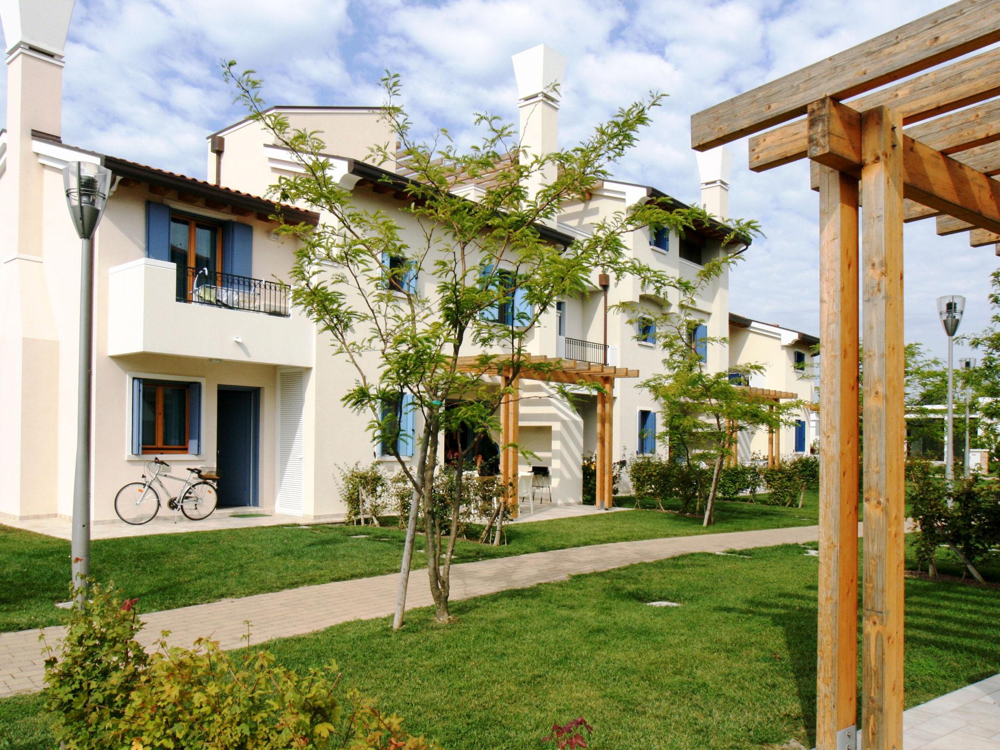 Foto 1 - Casa de 2 habitaciones en Caorle con piscina y jardín